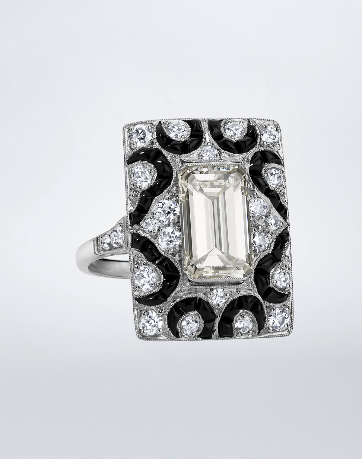 Reconceived Daring Deco Ring by Mindi Mond New York featuring a center diamond, old-cut diamonds, and calibrated black onyx set in platinum.