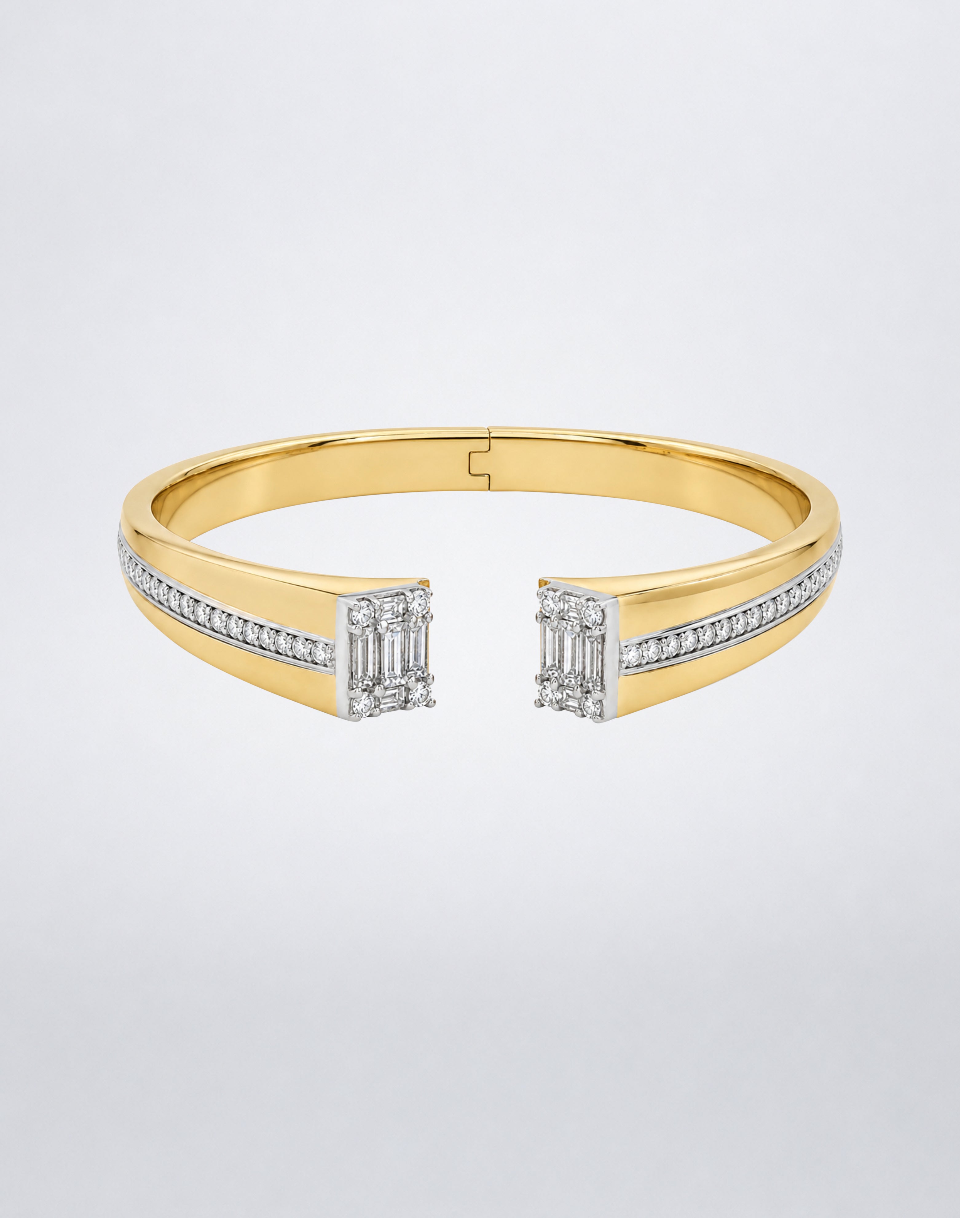 Mindi Mond New York Clarity³ Axis Bangle in 18k yellow gold, hinged open cuff with a channel of round brilliant diamonds ending in a nine-stone Clarity³ formation on each side, front view