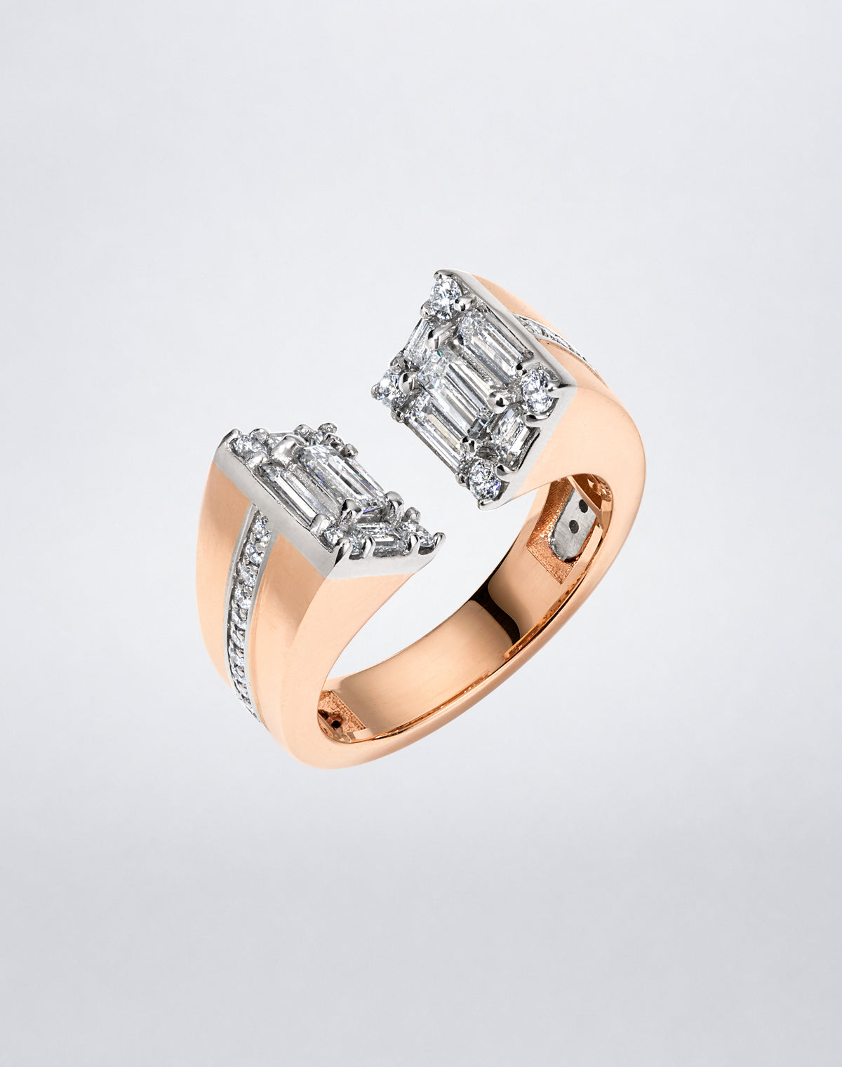 CLARITY³ Axis Ring in 18K rose gold with baguette-cut and round diamonds, angled view