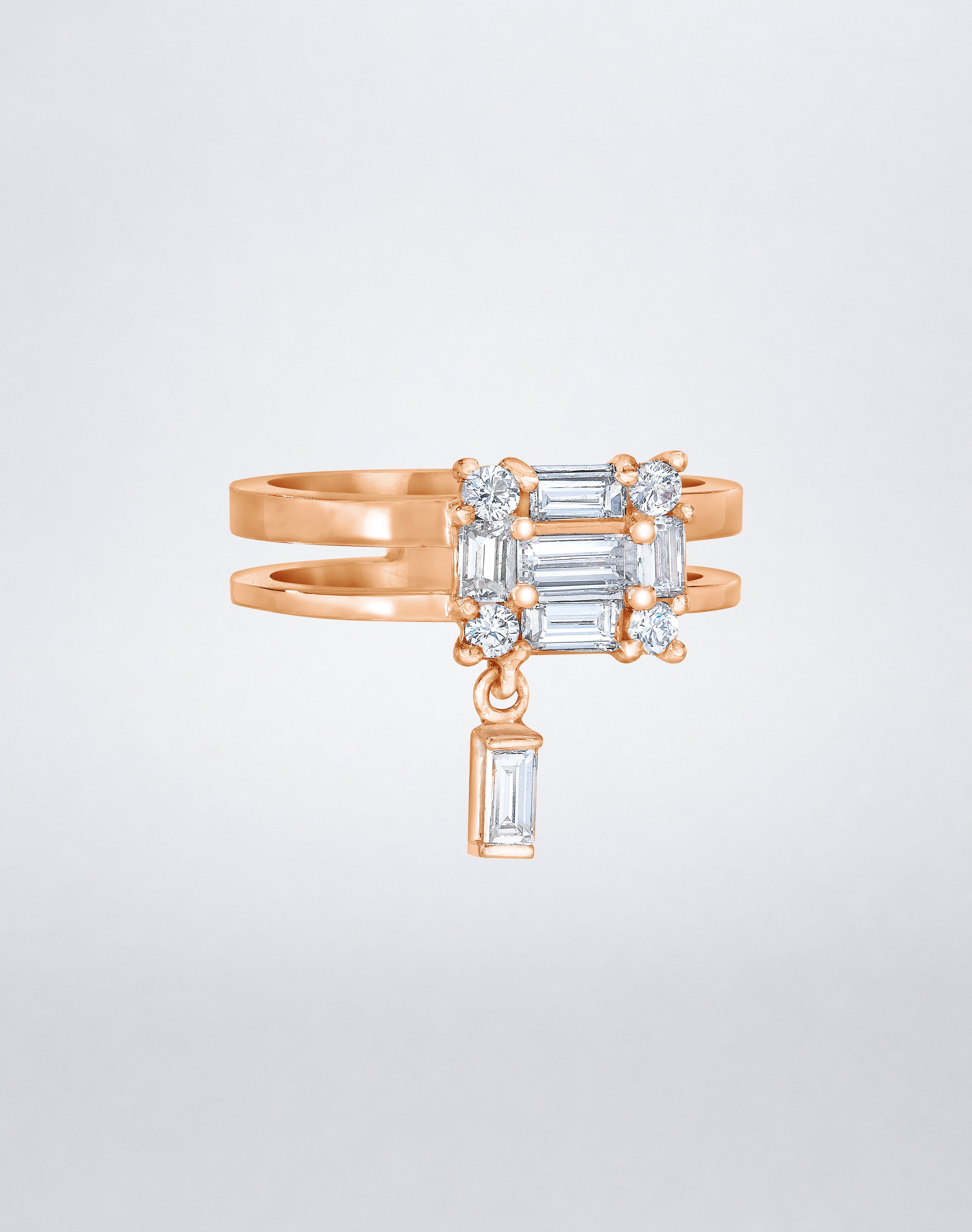 CLARITY³ Dangling Double Shank Ring in 18K rose gold, featuring a square cluster of baguette and round diamonds with a dangling baguette diamond below, by Mindi Mond New York