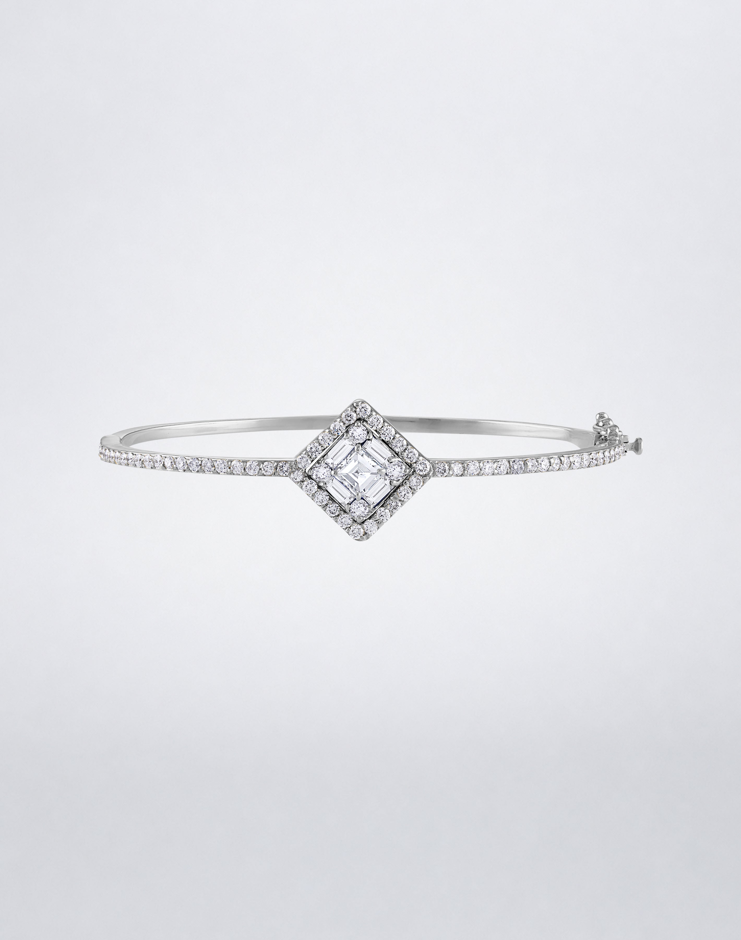 Mindi Mond New York Clarity³ Diamond Halo Bracelet in 18k white gold with a nine-stone baguette and round brilliant diamond center and pavé diamond band, front view