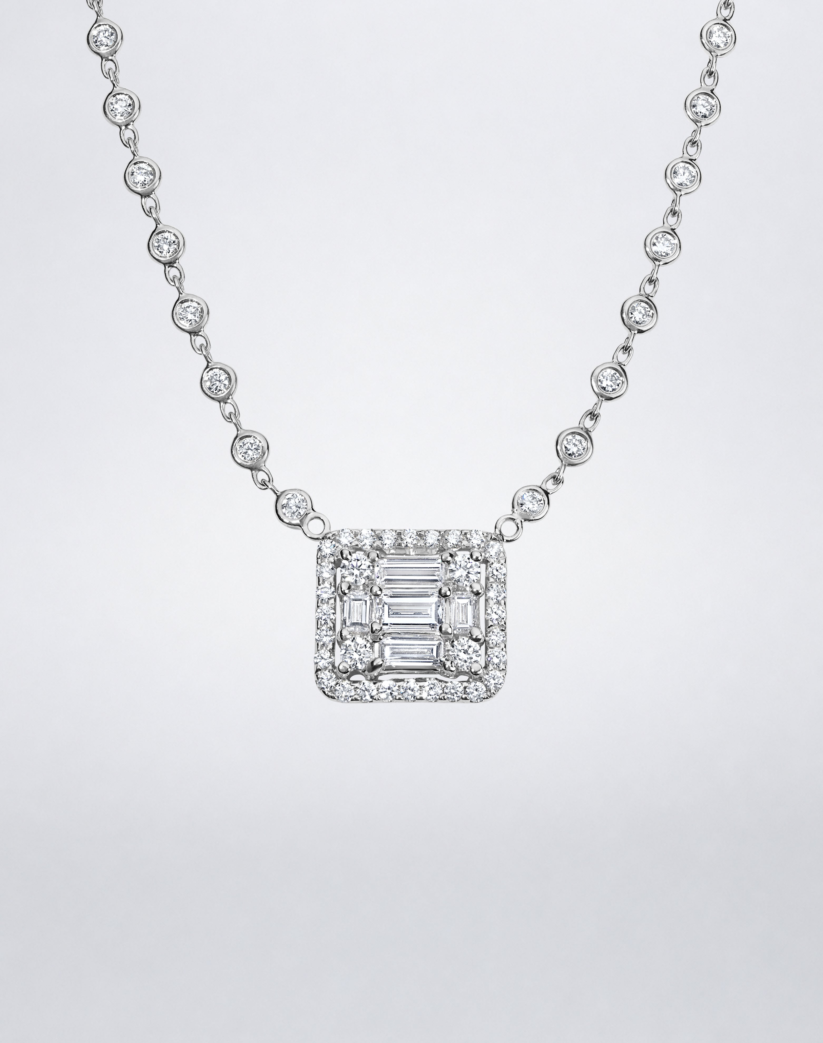Mindi Mond New York Clarity³ All Diamond Halo Cube Necklace in 18K white gold, close-up of the nine-stone diamond cube with pavé halo and bezel-set diamond chain