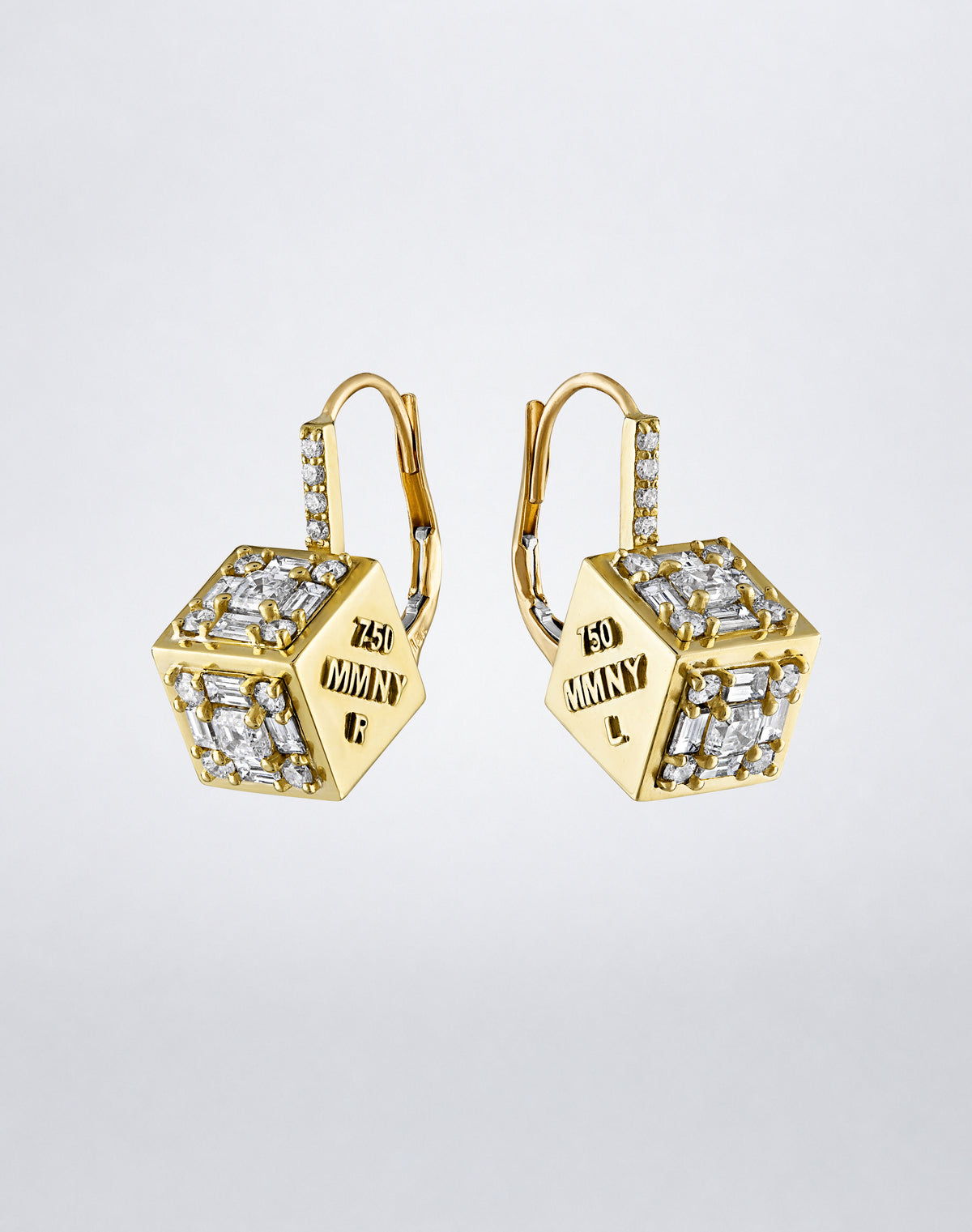 Clarity³ Dimensional Drop Earrings in 18K yellow gold, both cubes angled to reveal its hallmarked face