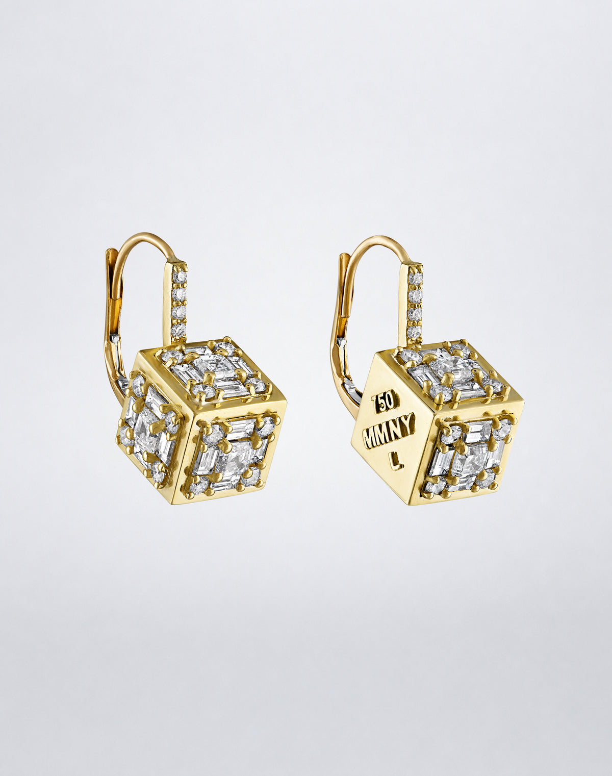 Clarity³ Dimensional Drop Earrings in 18K yellow gold in profile, diamond formations catching light across three faces