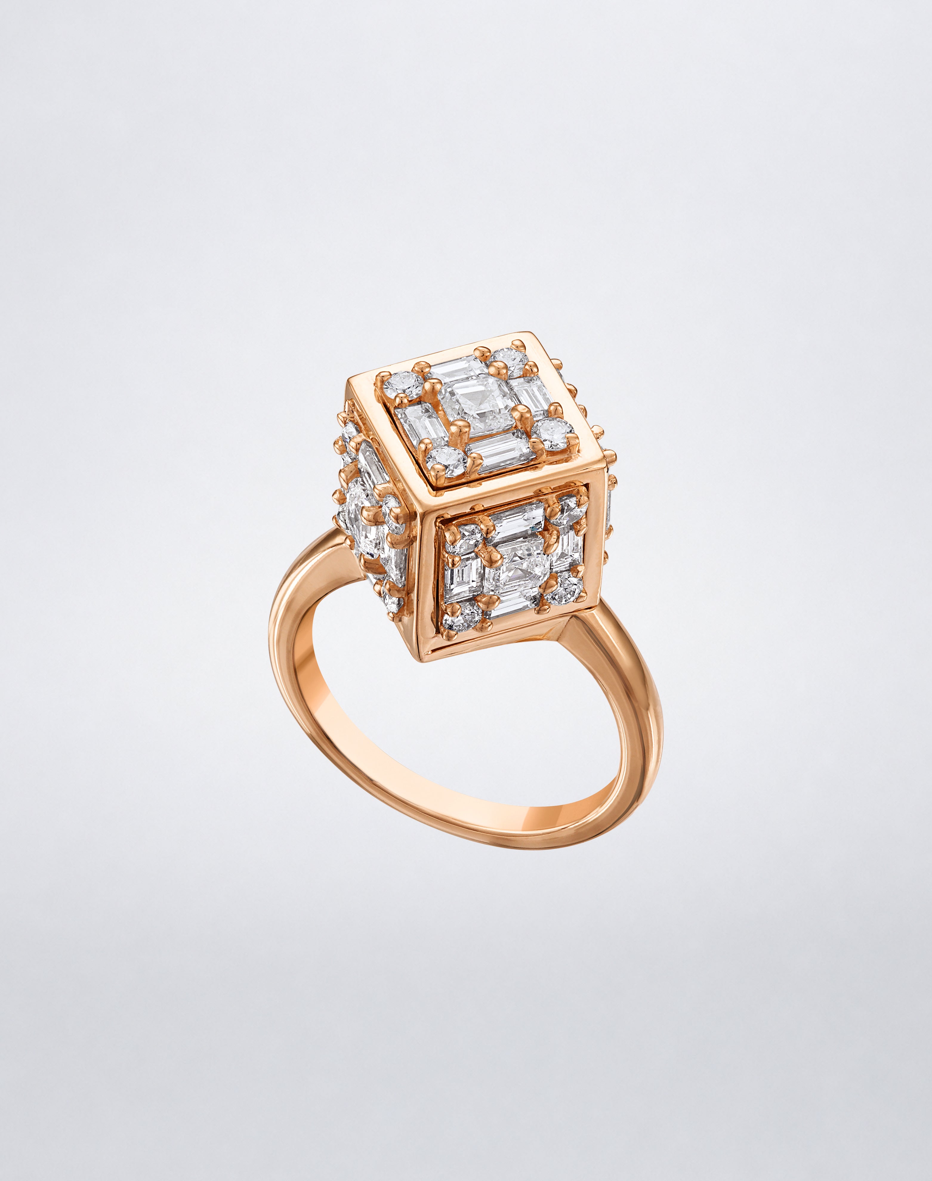 CLARITY³ Dimensional Gold Ring in 18K rose gold, featuring a sculptural cube set with baguette and round diamonds, shown at an angle, by Mindi Mond New York