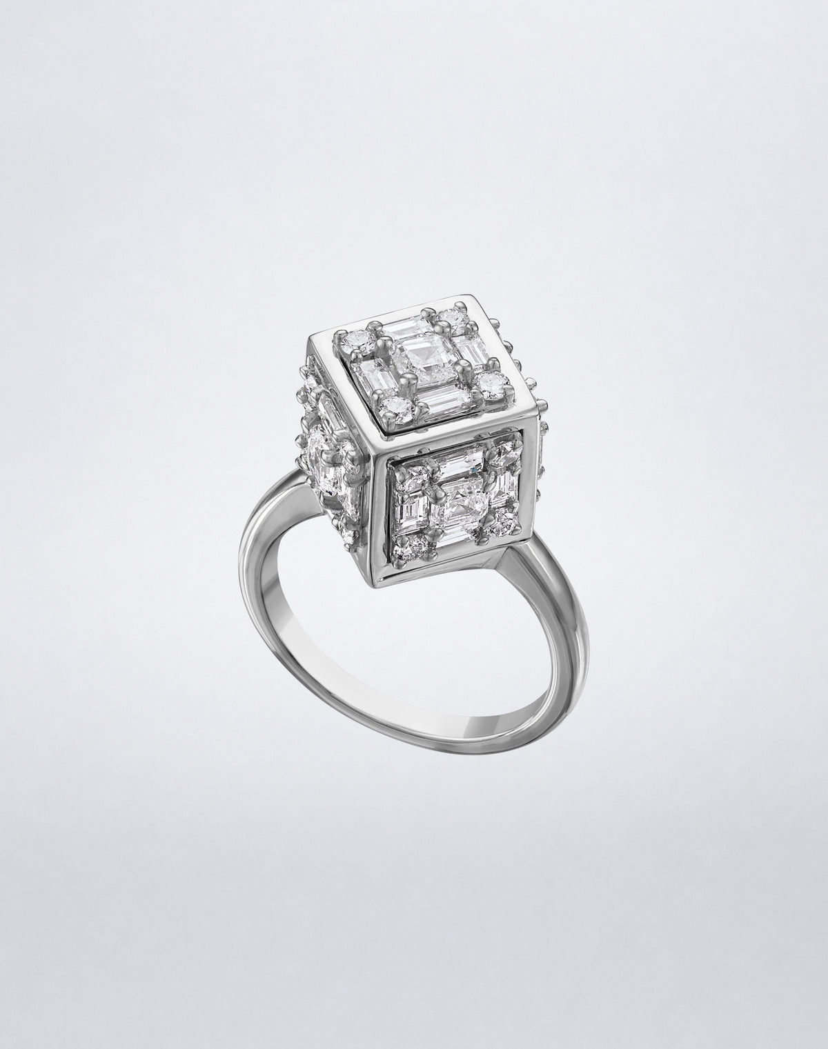 CLARITY³ Dimensional Gold Ring in 18K white gold, featuring a sculptural cube set with baguette and round diamonds, shown at an angle, by Mindi Mond New York