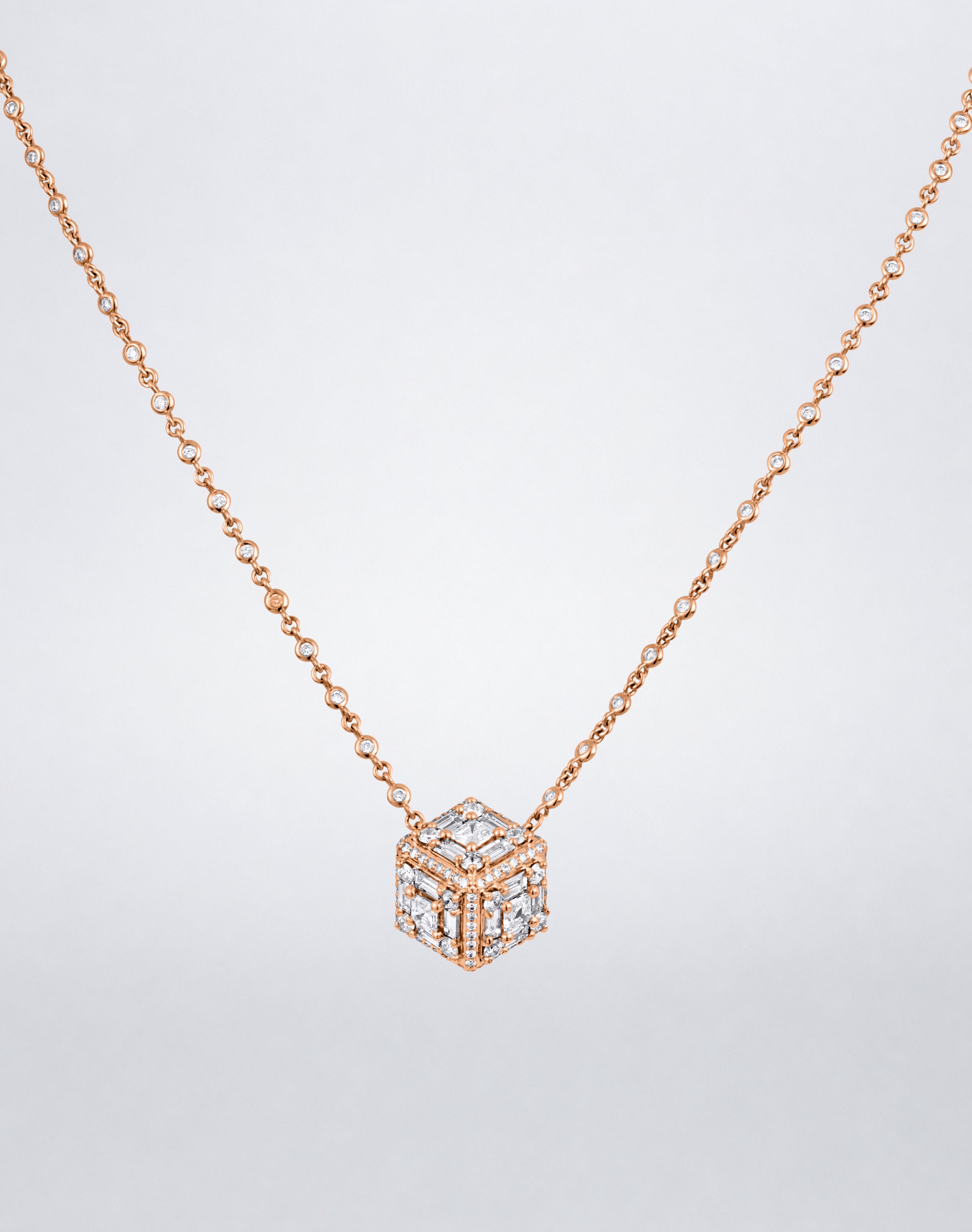 Mindi Mond New York Clarity³ Dimensional Halo Cube Necklace in 18K rose gold, three-dimensional diamond cube with a nine-stone formation on each face and pavé edges, on a bezel-set diamond chain