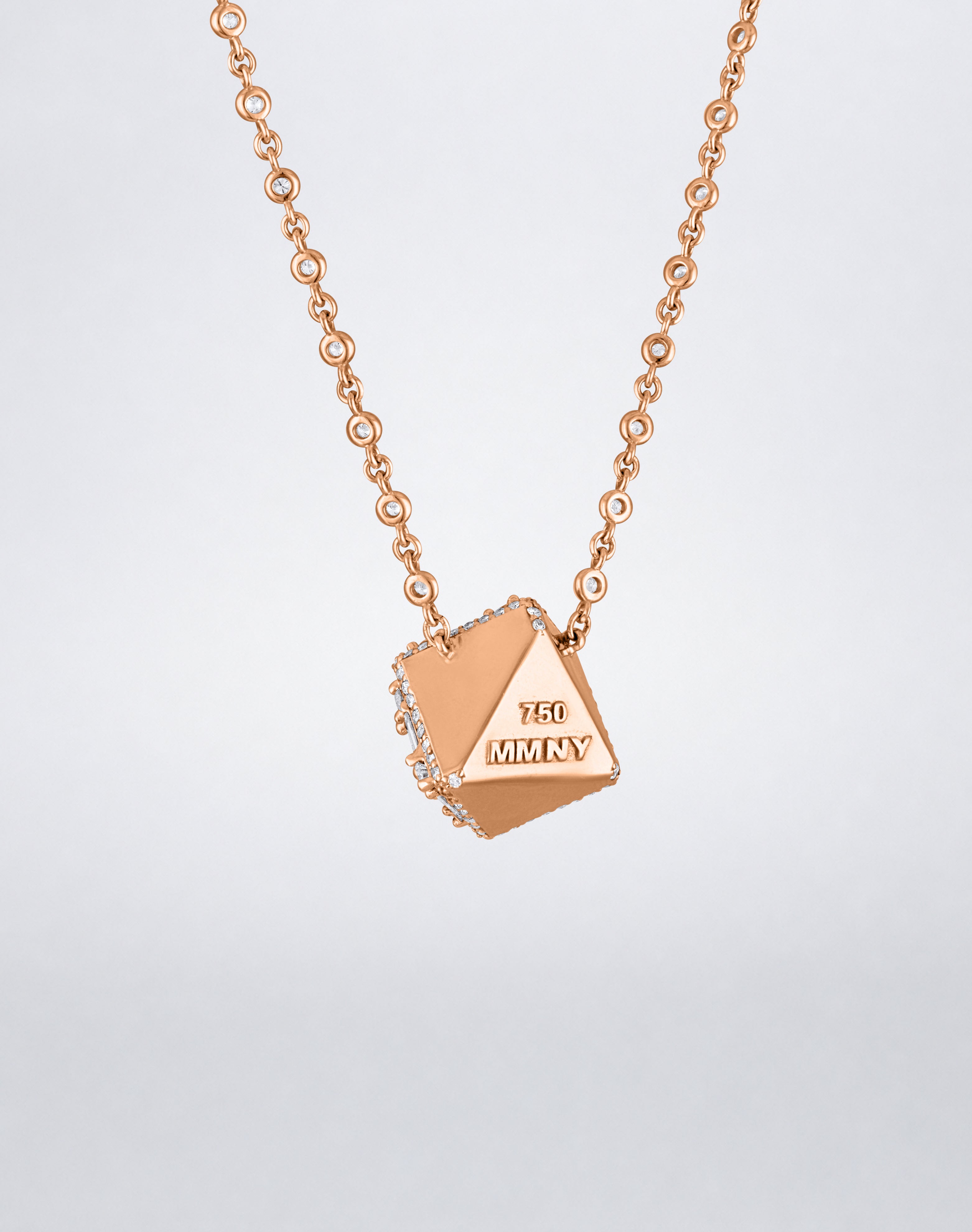 Mindi Mond New York Clarity³ Dimensional Halo Cube Necklace in 18K rose gold, back of the cube showing polished gold faces and MMNY 750 hallmark