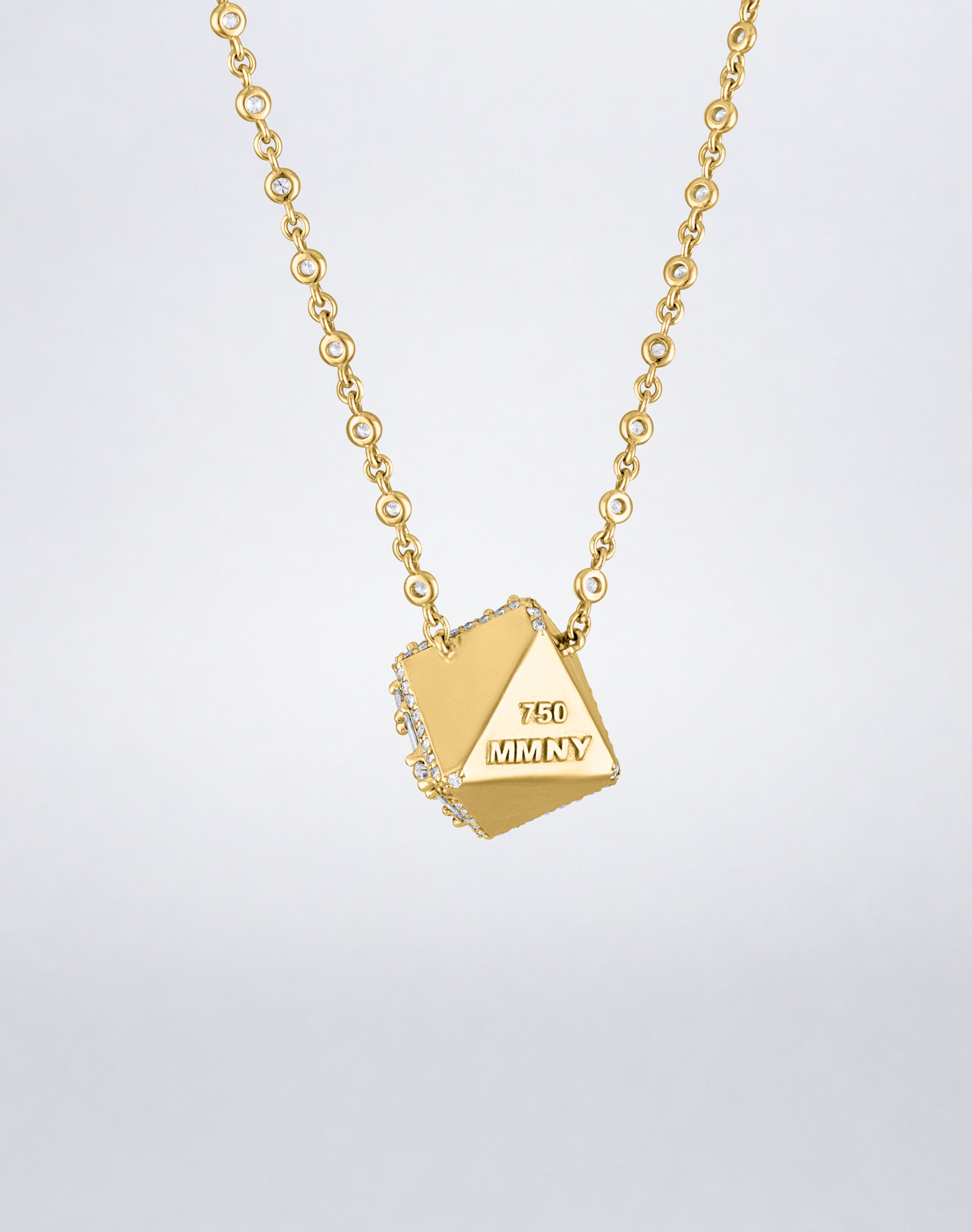 Mindi Mond New York Clarity³ Dimensional Halo Cube Necklace in 18K yellow gold, back of the cube showing polished gold faces and MMNY 750 hallmark