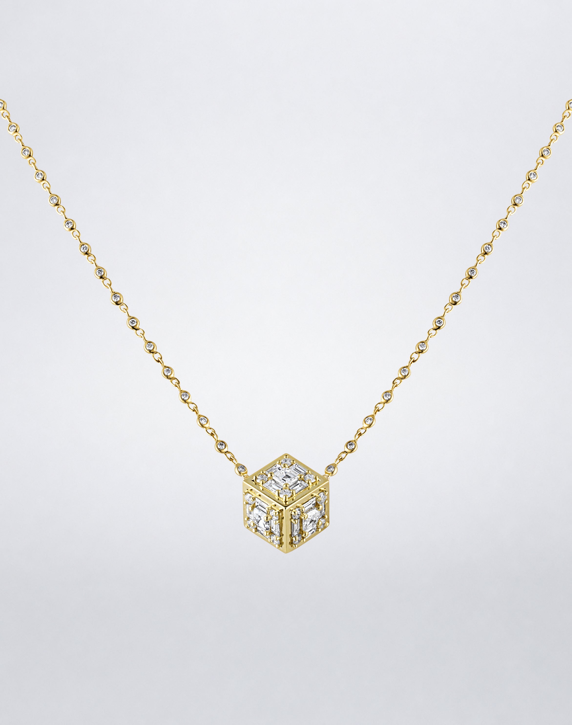 Mindi Mond New York Clarity³ Dimensional Gold Pendant Necklace in 18K yellow gold, three-dimensional diamond cube with a nine-stone formation on each face and polished gold edges, on a bezel-set diamond chain, full view