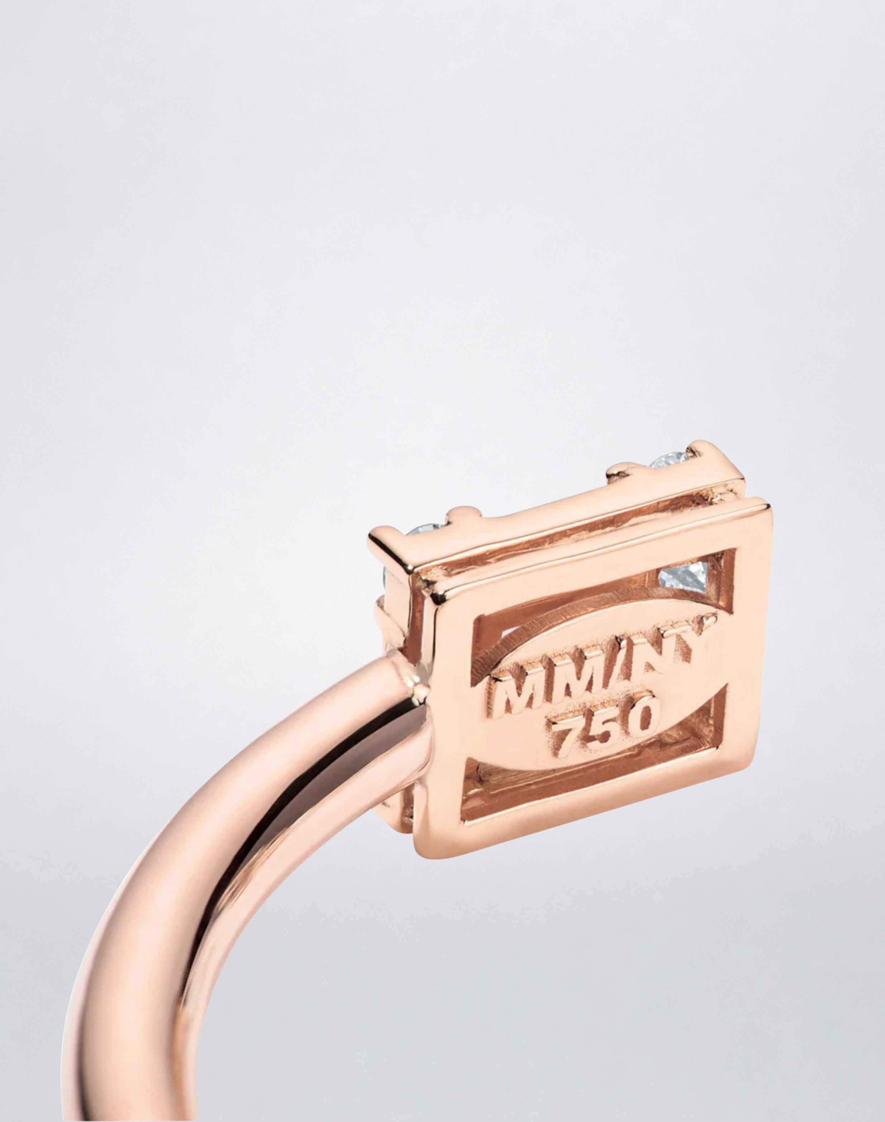 Mindi Mond New York Clarity³ Dual Cube Hinged Bangle in 18k rose gold, close-up of the open-backed diamond formation with MM/NY 750 hallmark