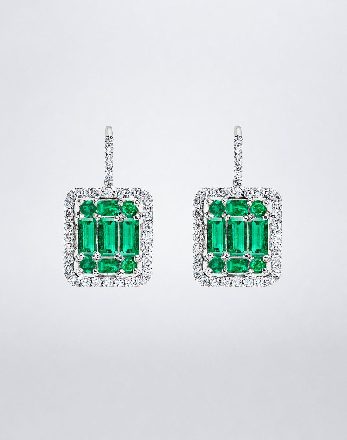 Mindi Mond New York Clarity³ Classic Emerald Halo Earrings in 18K white gold, a nine-stone emerald formation framed in a diamond halo on a pavé lever-back