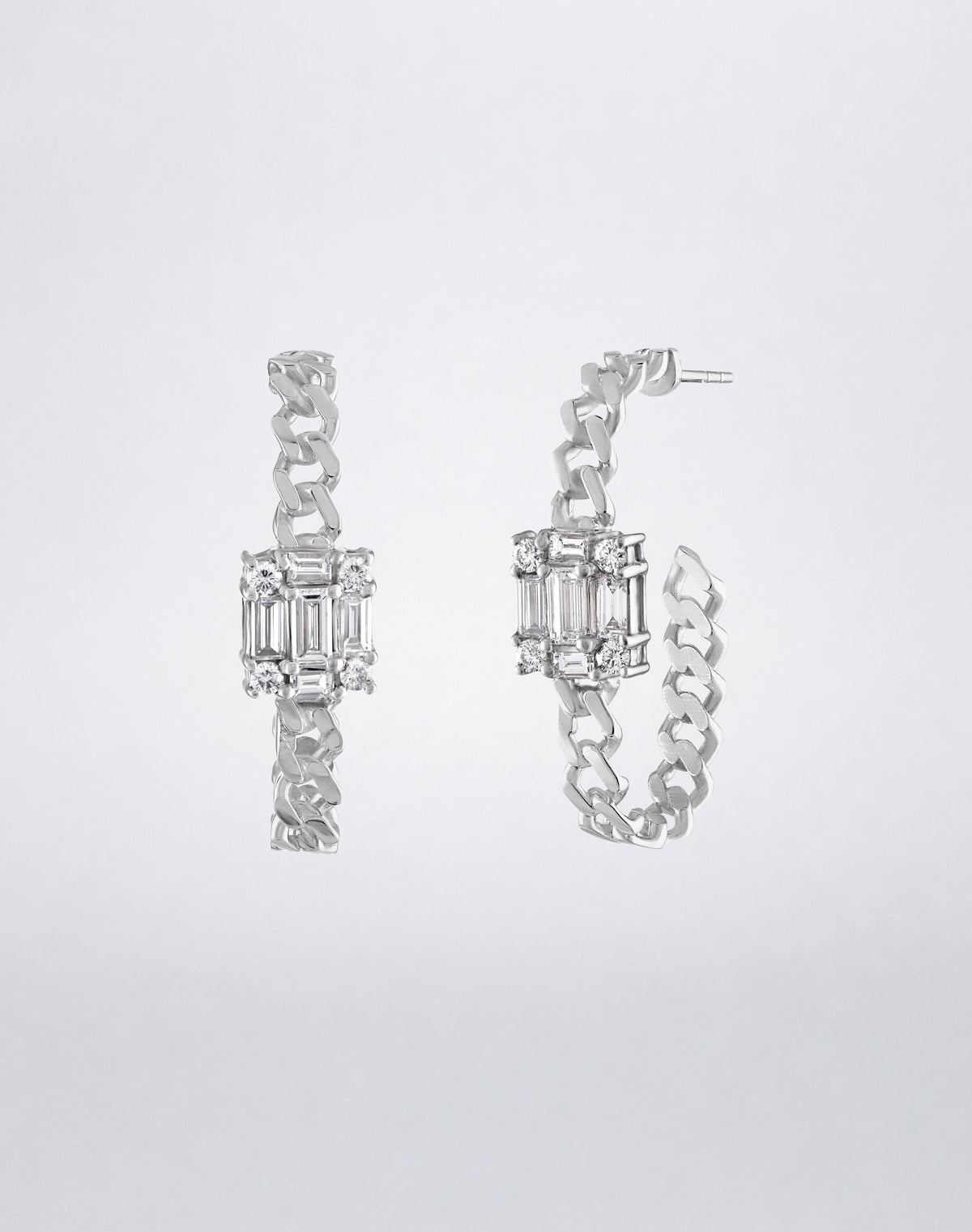 Mindi Mond New York Clarity³ Oval Link Hoops in 18K white gold, a diamond formation set within a hoop of polished oval links