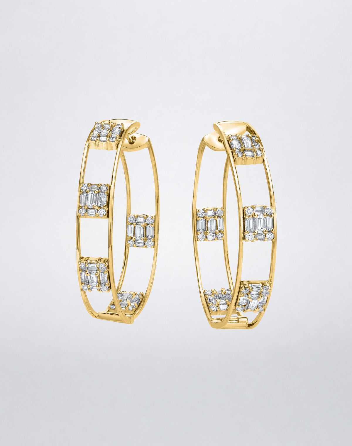 Mindi Mond New York Clarity³ Polished Gold Hoops in 18K yellow gold, nine-stone diamond formations set at intervals around a slender polished double-rail hoop