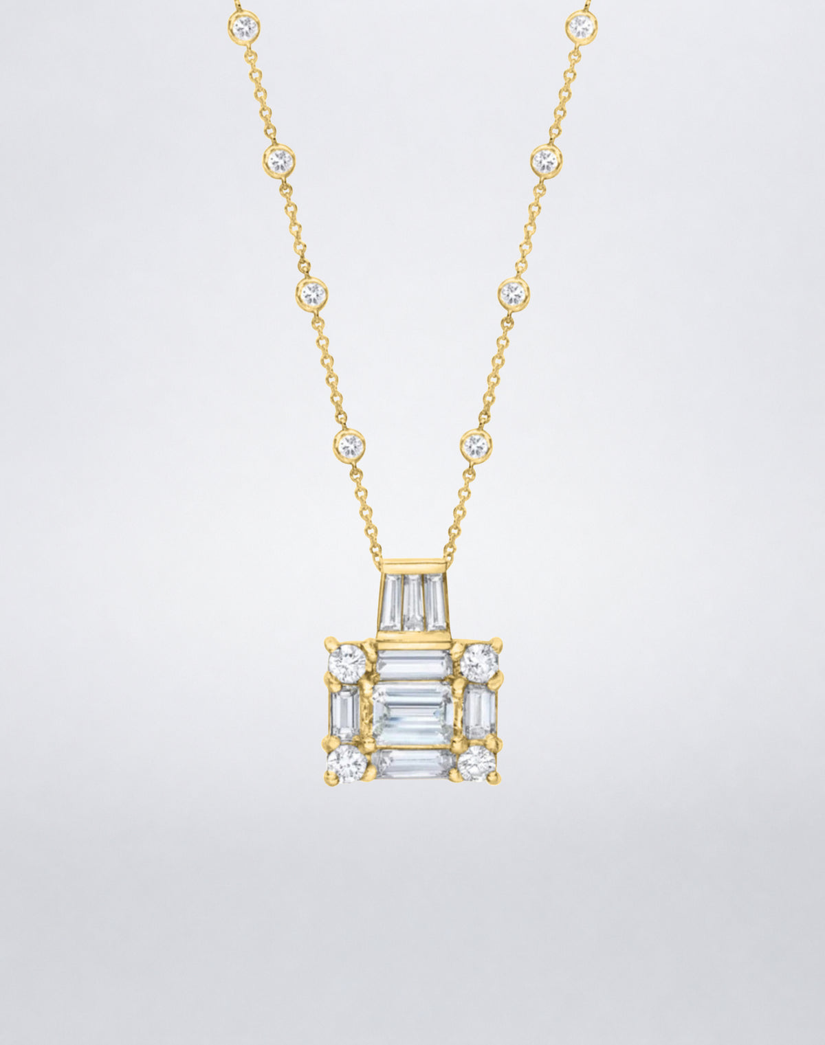 A Mindi Mond New York statement necklace with the Clarity³ diamond cube, baguette and round brilliants, on a diamond-set 18k yellow gold chain, close