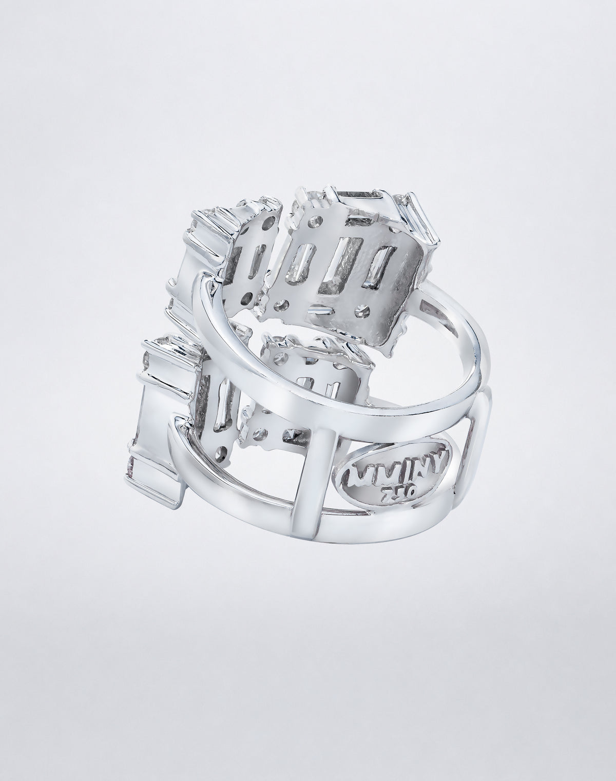 CLARITY³ Quad Ring in 18K white gold featuring four rectangular clusters of baguette-cut and round diamonds, back view