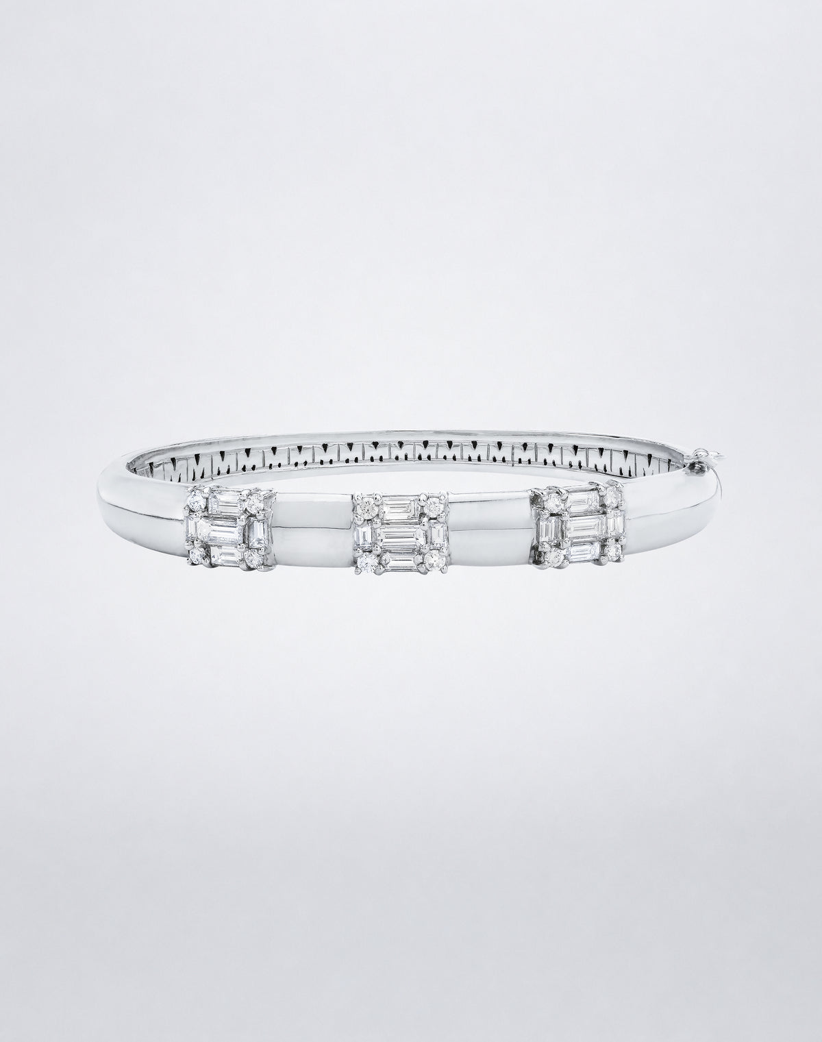 Mindi Mond New York Clarity³ 3 Section Hinged Bangle in 18k white gold with three nine-stone baguette and round brilliant diamond formations, front view