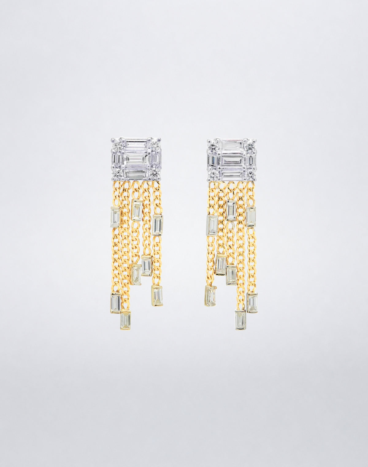 Mindi Mond New York Clarity³ Tassel Earrings in 18K yellow gold, a diamond formation trailing five chains tipped with baguette diamonds