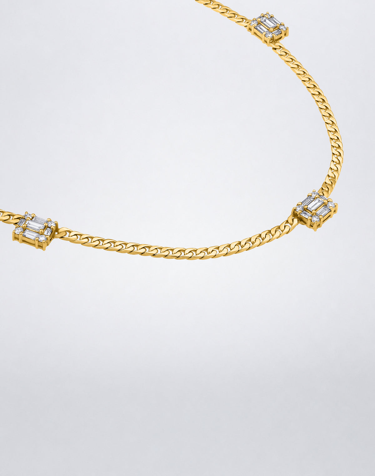 Mindi Mond New York Clarity³ Triple Link Necklace in 18K yellow gold, close angle on the curb-link chain and three nine-stone diamond cubes