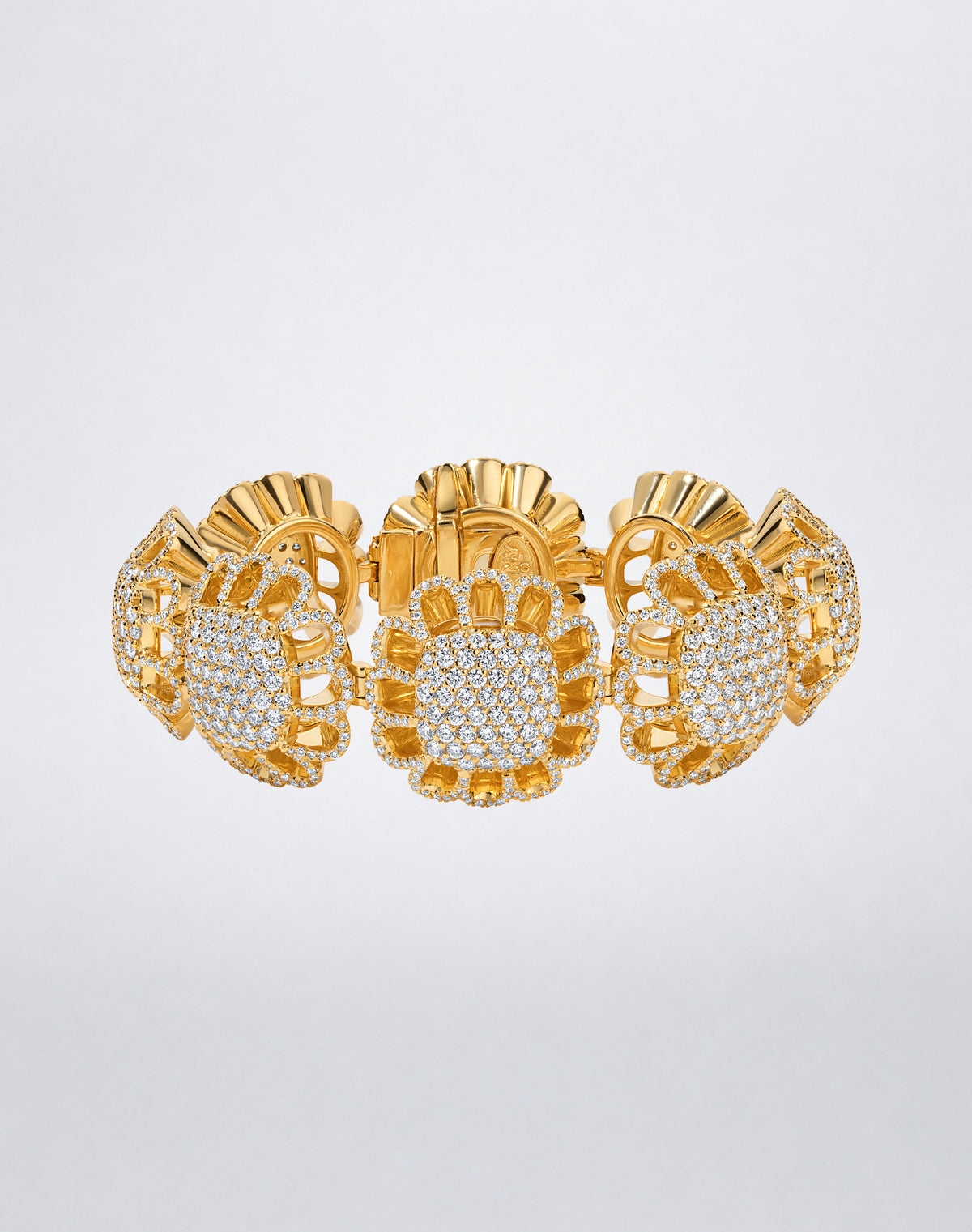 Mindi Mond New York Floating Hues All Diamond Bracelet with round brilliant diamonds in signature elliptical settings in 18K yellow gold