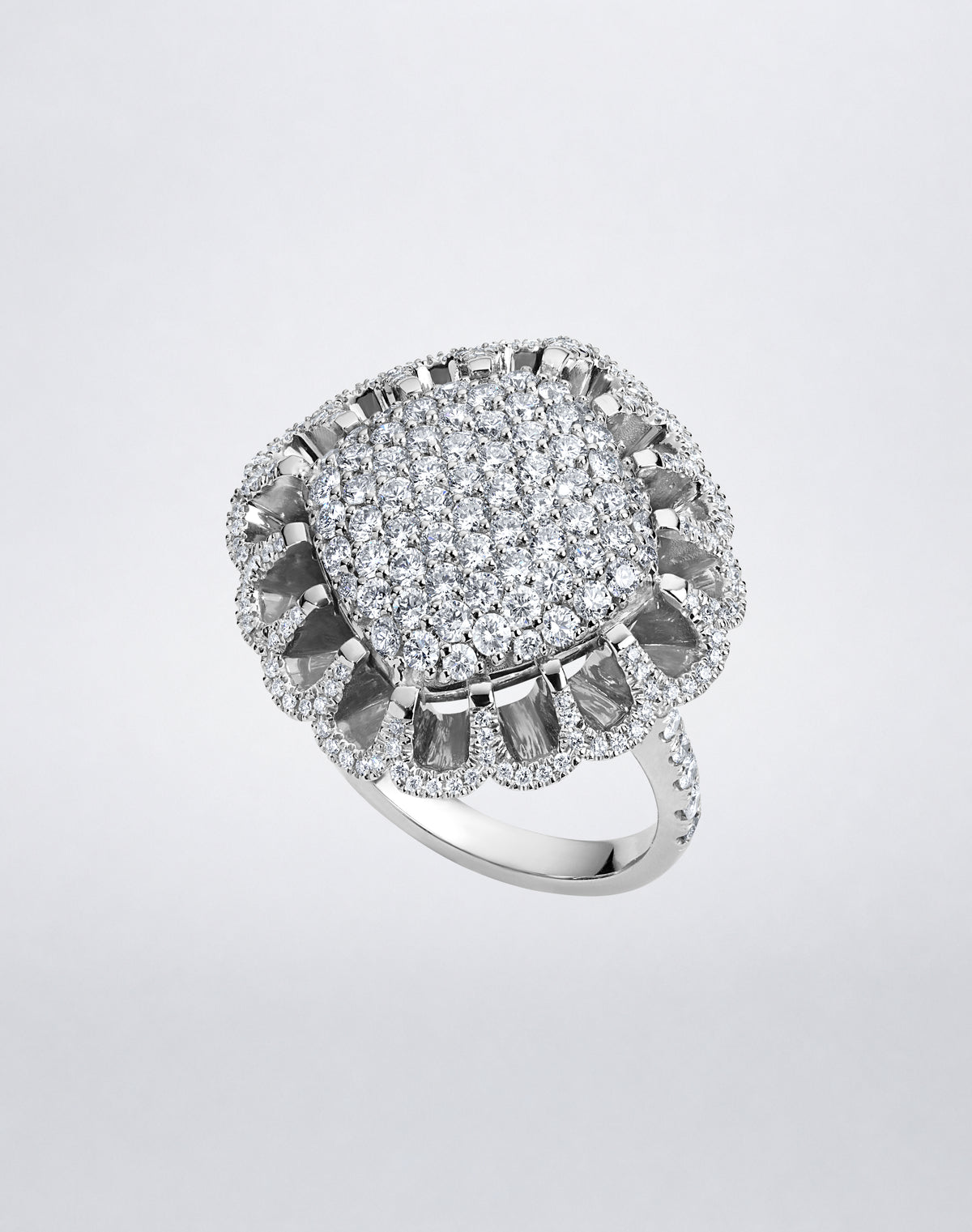 Mindi Mond New York FLOATING HUES All Diamond Ring in 18K white gold, angled view showcasing diamonds in the iconic elliptical setting.