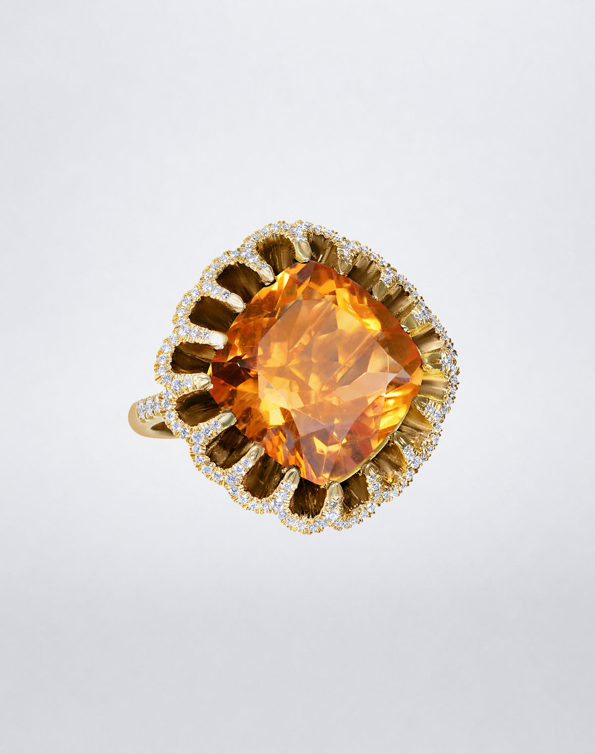 Mindi Mond New York FLOATING HUES Citrine and Diamond Ring in 18K yellow gold, angled view featuring an oval-cut citrine in the iconic elliptical setting.