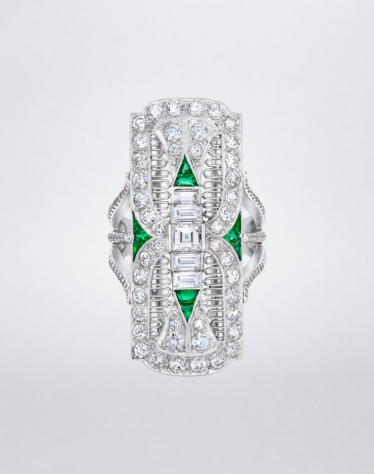 One-of-a-kind Platinum Filigree Emerald and Diamond Cocktail Ring featuring geometric emerald and diamond accents within an intricate openwork platinum design.