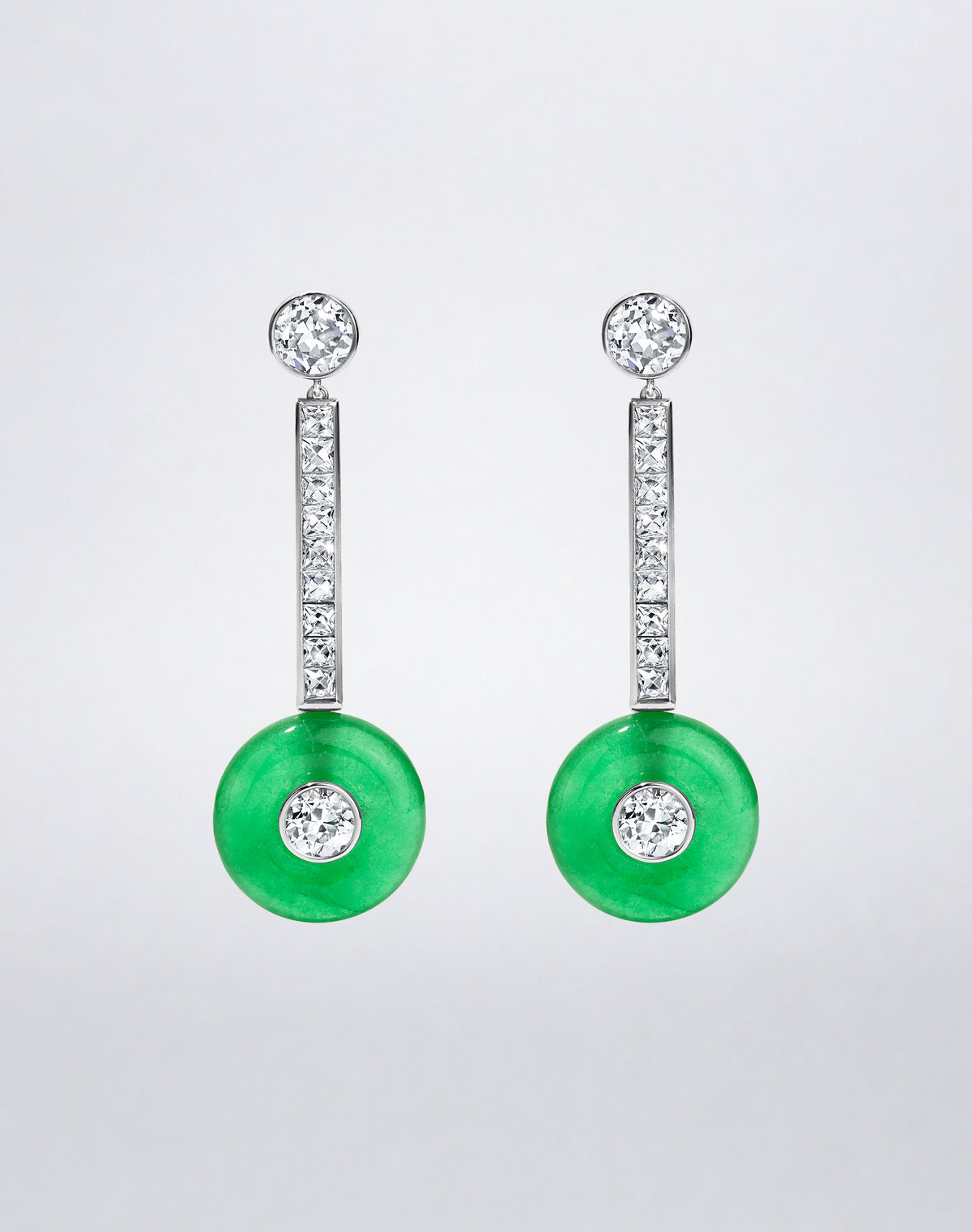 One-of-a-kind Jadeite and French-Cut Diamond Drop Earrings featuring vivid green jadeite discs, French-cut diamond bars and round diamond accents.