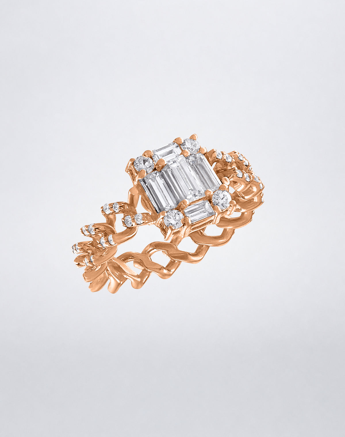 CLARITY³ All Diamond Link Ring in 18K rose gold, featuring a diamond-set curb-link band and a baguette diamond cluster, shown at an angle, by Mindi Mond New York