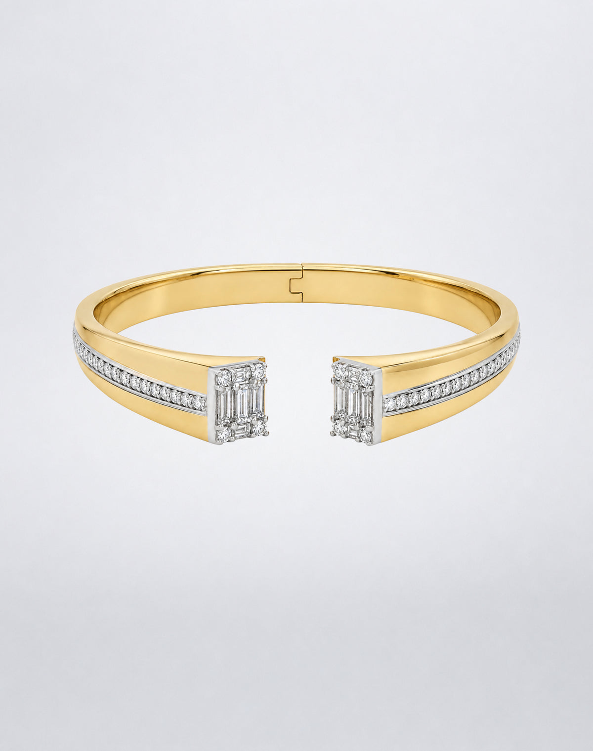 Mindi Mond New York Clarity³ Axis Bangle in 18k yellow gold, hinged open cuff with a channel of round brilliant diamonds ending in a nine-stone Clarity³ formation on each side, front view