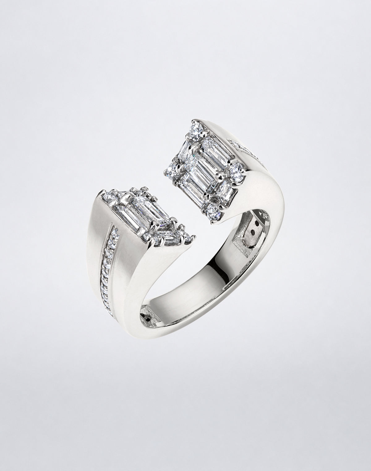 CLARITY³ Axis Ring in 18K white gold with baguette-cut and round diamonds, angled view