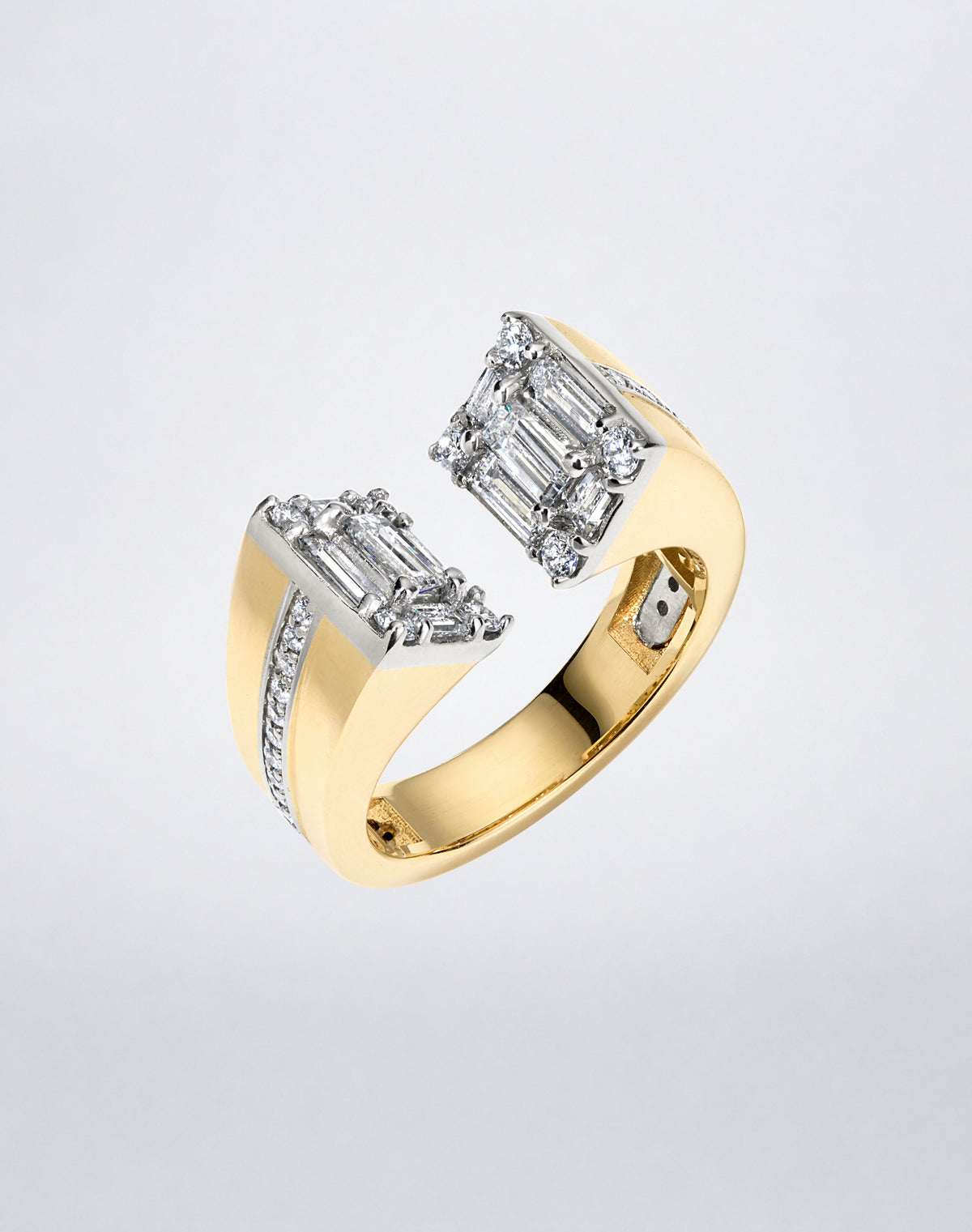 CLARITY³ Axis Ring in 18K yellow gold with baguette-cut and round diamonds, angled view