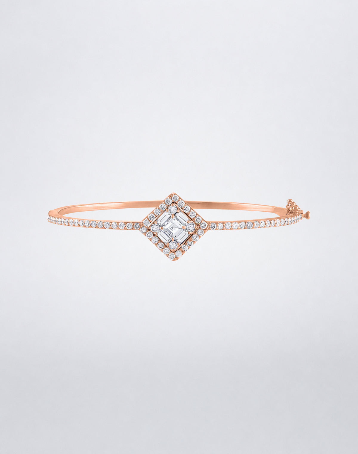 Mindi Mond New York Clarity³ Diamond Halo Bracelet in 18k rose gold with a nine-stone baguette and round brilliant diamond center and pavé diamond band, front view