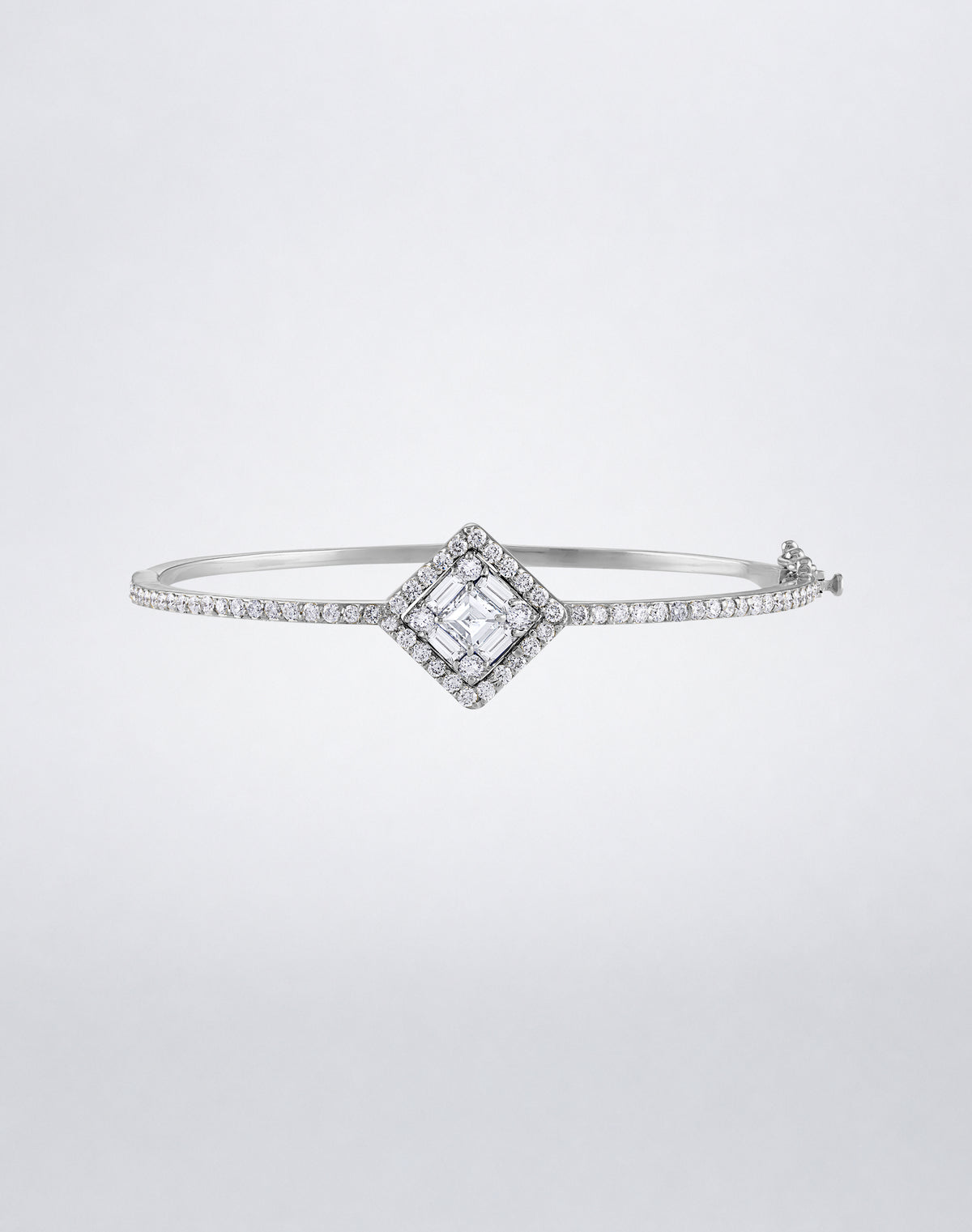 Mindi Mond New York Clarity³ Diamond Halo Bracelet in 18k white gold with a nine-stone baguette and round brilliant diamond center and pavé diamond band, front view