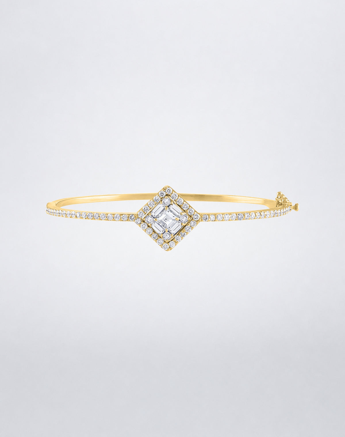 Mindi Mond New York Clarity³ Diamond Halo Bracelet in 18k yellow gold with a nine-stone baguette and round brilliant diamond center and pavé diamond band, front view