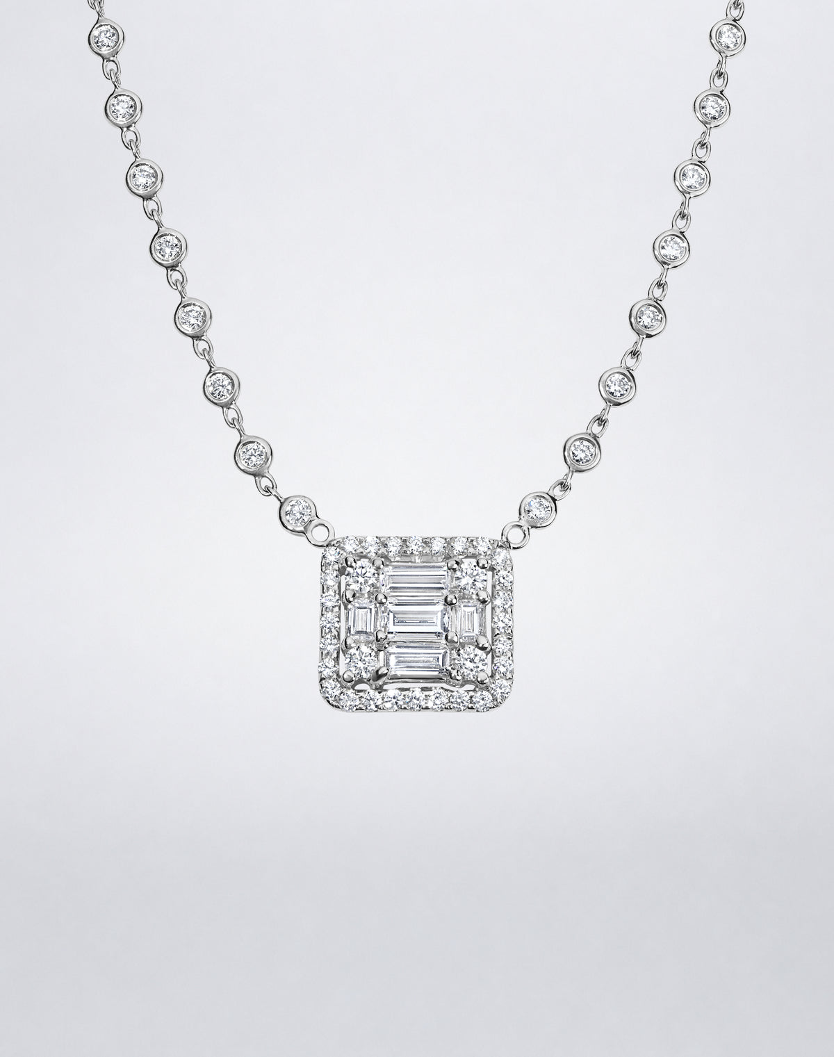 Mindi Mond New York Clarity³ All Diamond Halo Cube Necklace in 18K white gold, close-up of the nine-stone diamond cube with pavé halo and bezel-set diamond chain