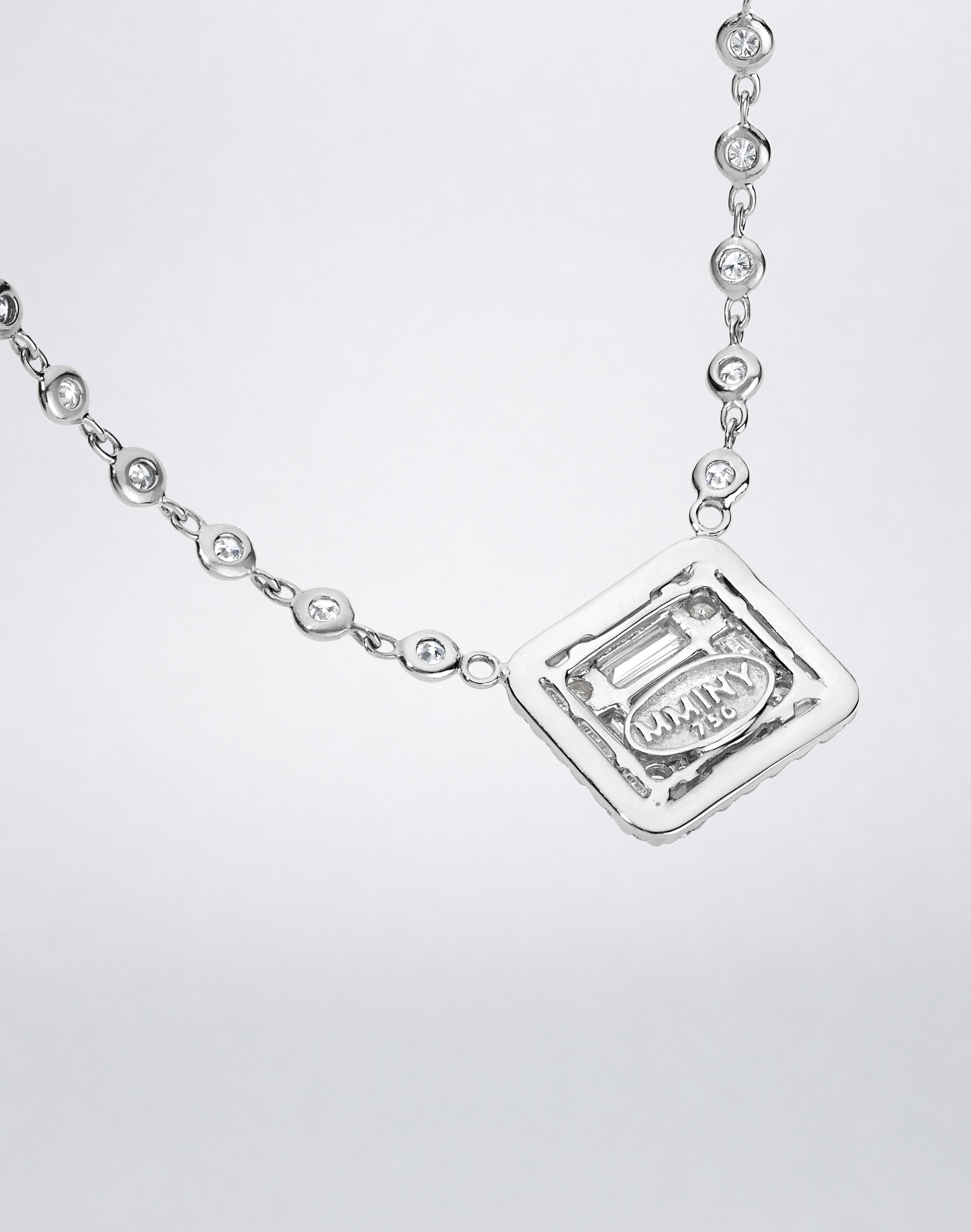 Mindi Mond New York Clarity³ All Diamond Halo Cube Necklace in 18K white gold, back of the halo cube showing the open setting and MMINY 750 hallmark