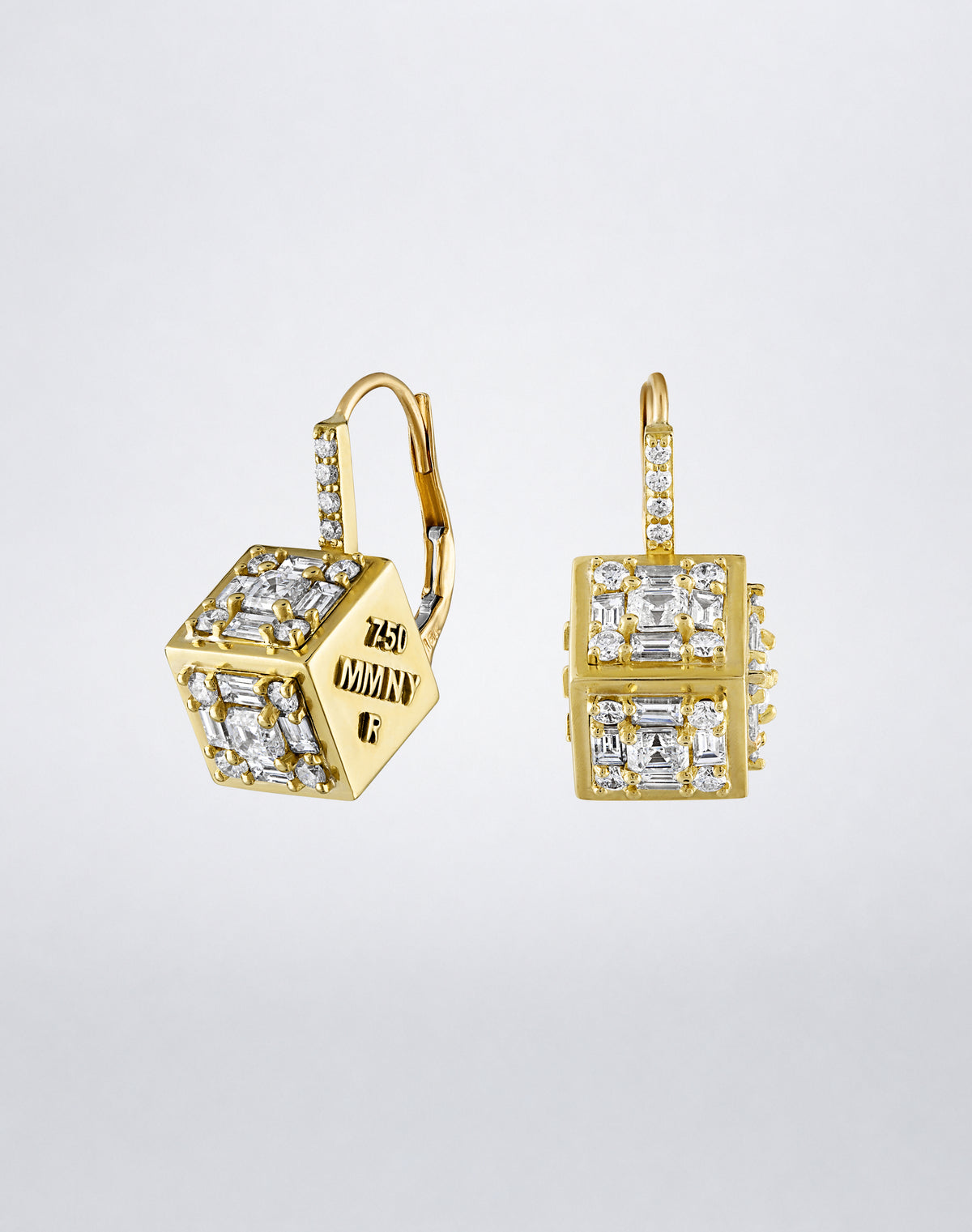 Clarity³ Dimensional Drop Earrings in 18K yellow gold, one cube angled to reveal its hallmarked face