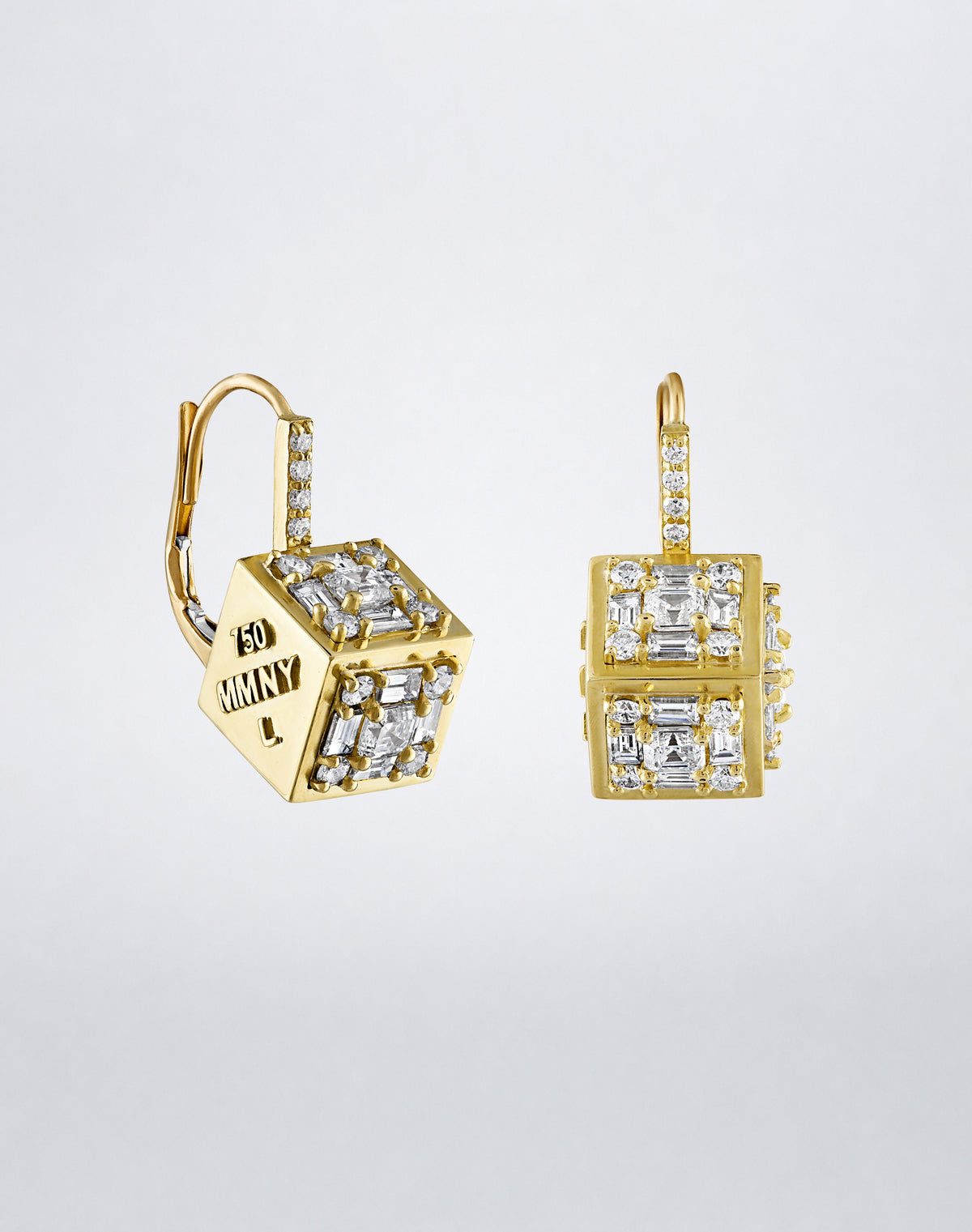 Clarity³ Dimensional Drop Earrings in 18K yellow gold in profile, hallmarked face and diamond faces in view