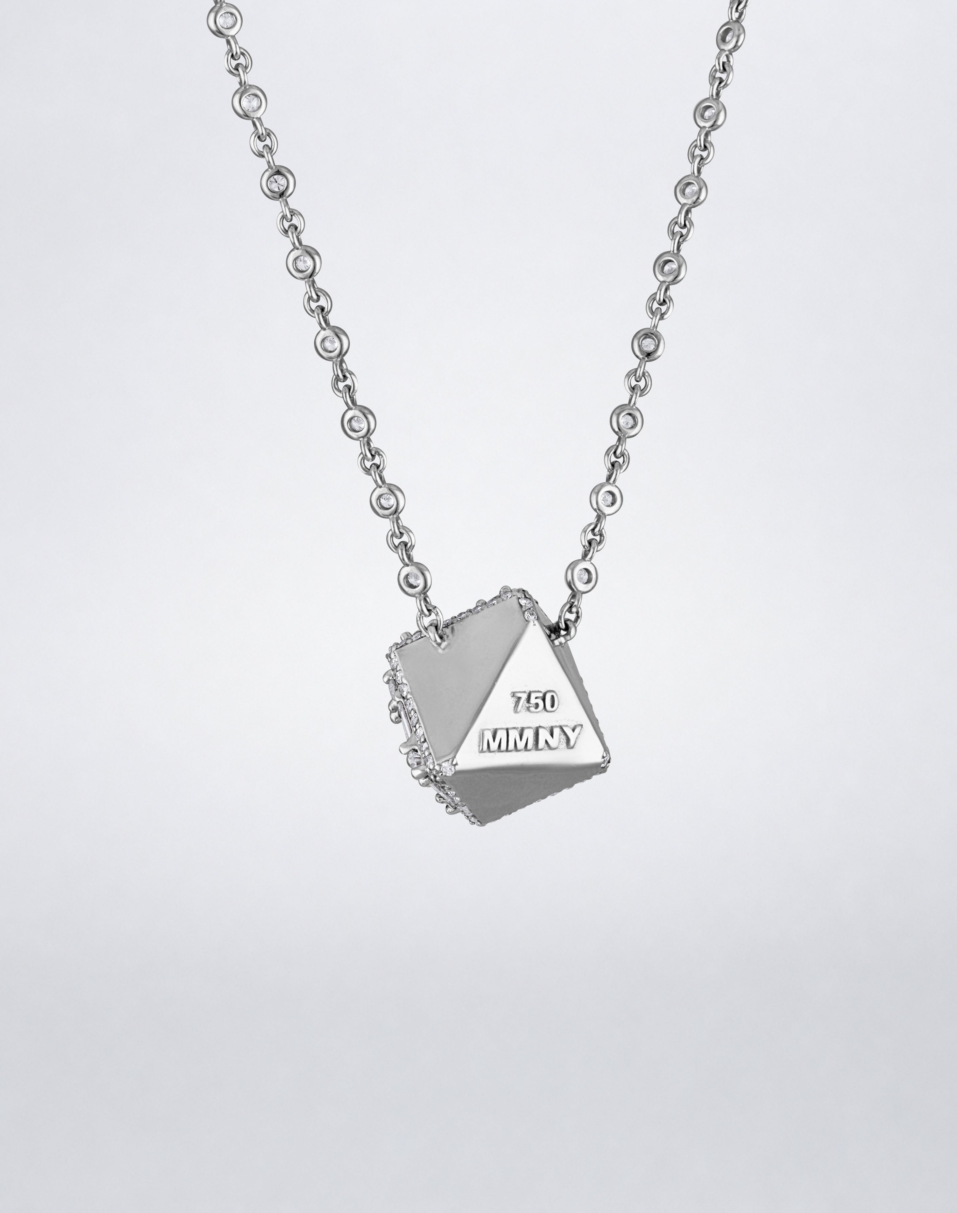 Mindi Mond New York Clarity³ Dimensional Halo Cube Necklace in 18K white gold, back of the cube showing polished gold faces and MMNY 750 hallmark