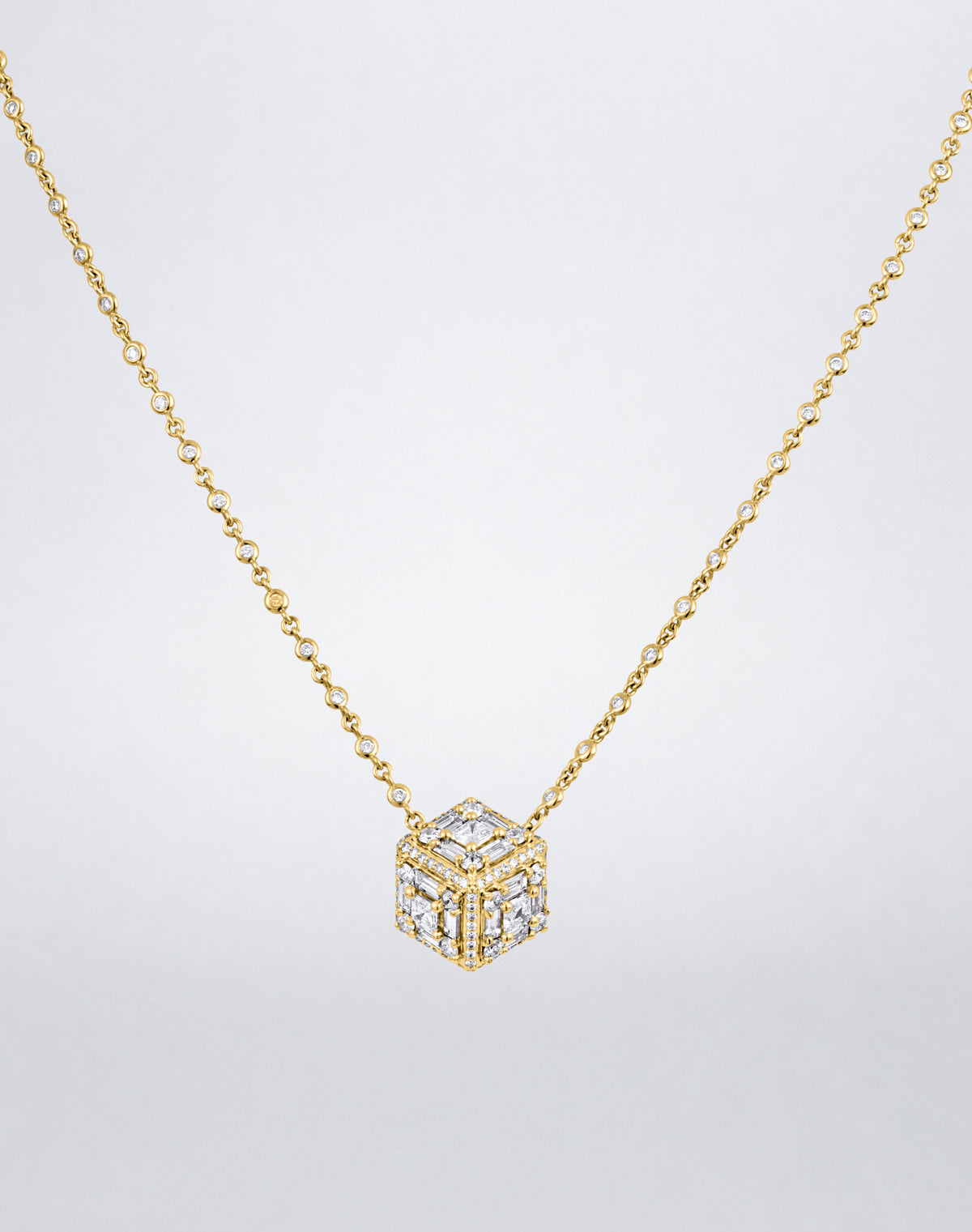 Mindi Mond New York Clarity³ Dimensional Halo Cube Necklace in 18K yellow gold, three-dimensional diamond cube with a nine-stone formation on each face and pavé edges, on a bezel-set diamond chain