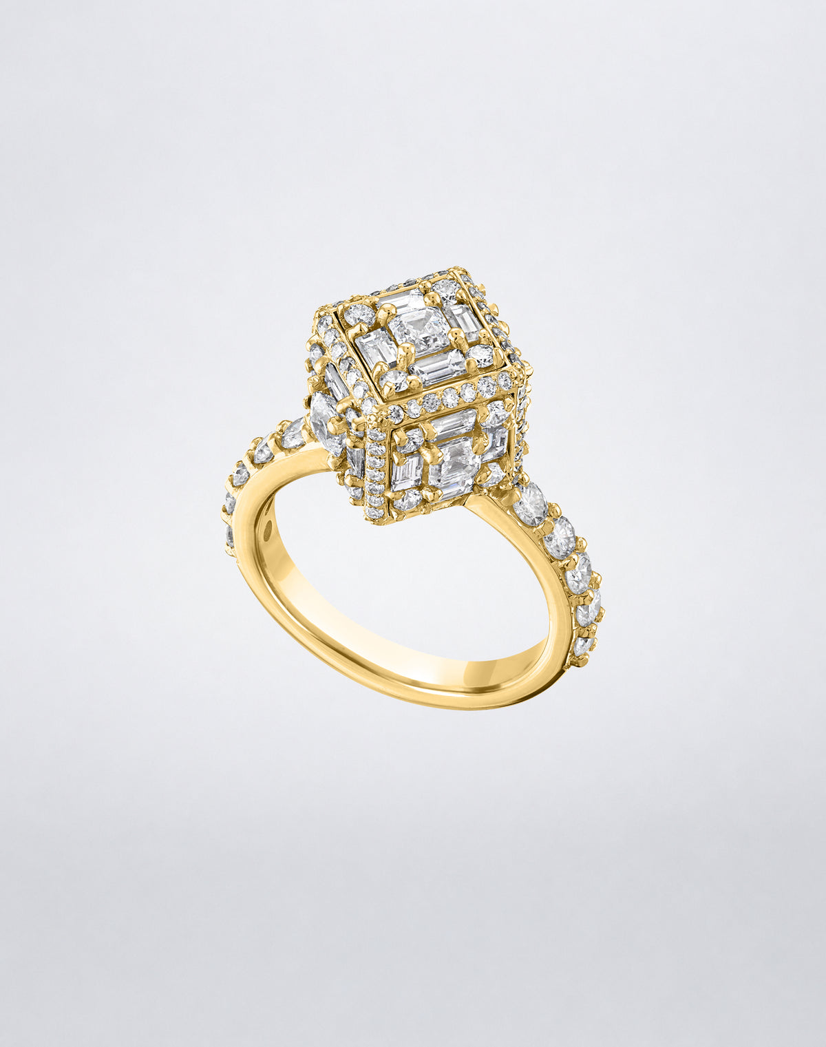 CLARITY³ Dimensional Halo Diamond Ring in 18K yellow gold, featuring a sculptural diamond cube on a pavé diamond shank, shown at an angle, by Mindi Mond New York