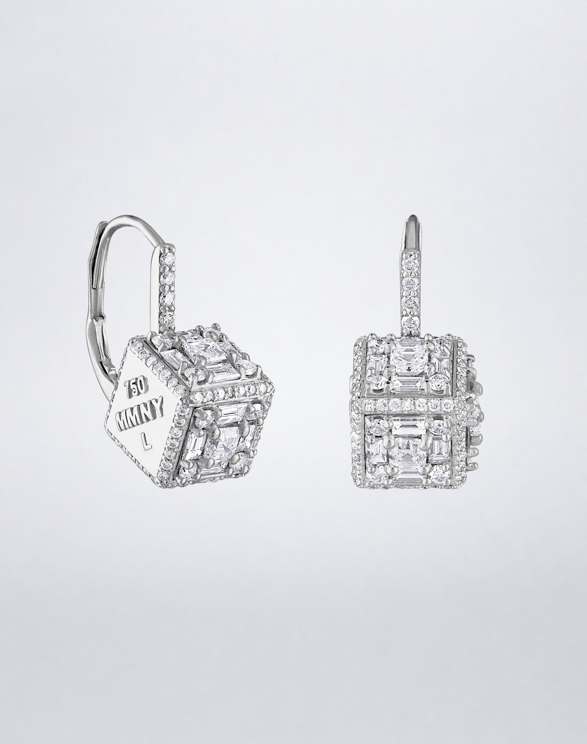 Mindi Mond New York Clarity³ Dimensional Mega Halo Drop Earrings in 18K white gold, the engraved MMNY face framed by a pavé halo beside diamond-set faces