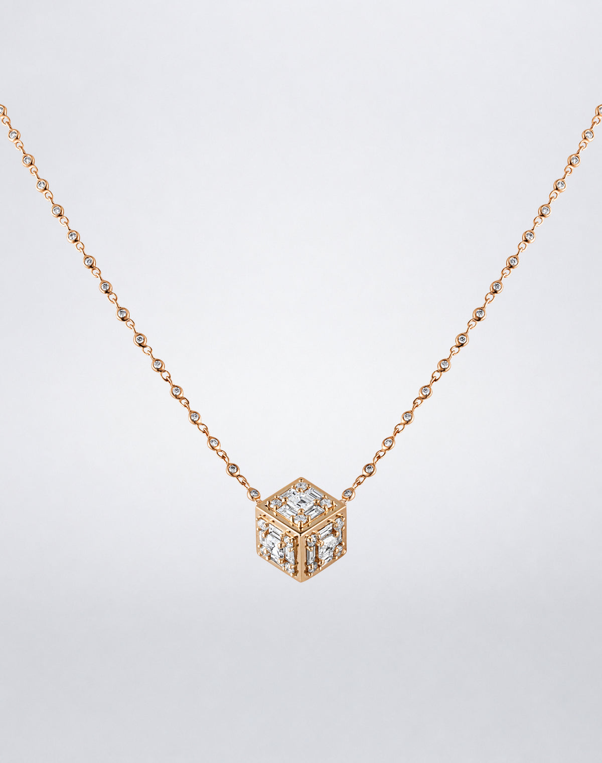 Mindi Mond New York Clarity³ Dimensional Gold Pendant Necklace in 18K rose gold, three-dimensional diamond cube with a nine-stone formation on each face and polished gold edges, on a bezel-set diamond chain, full view