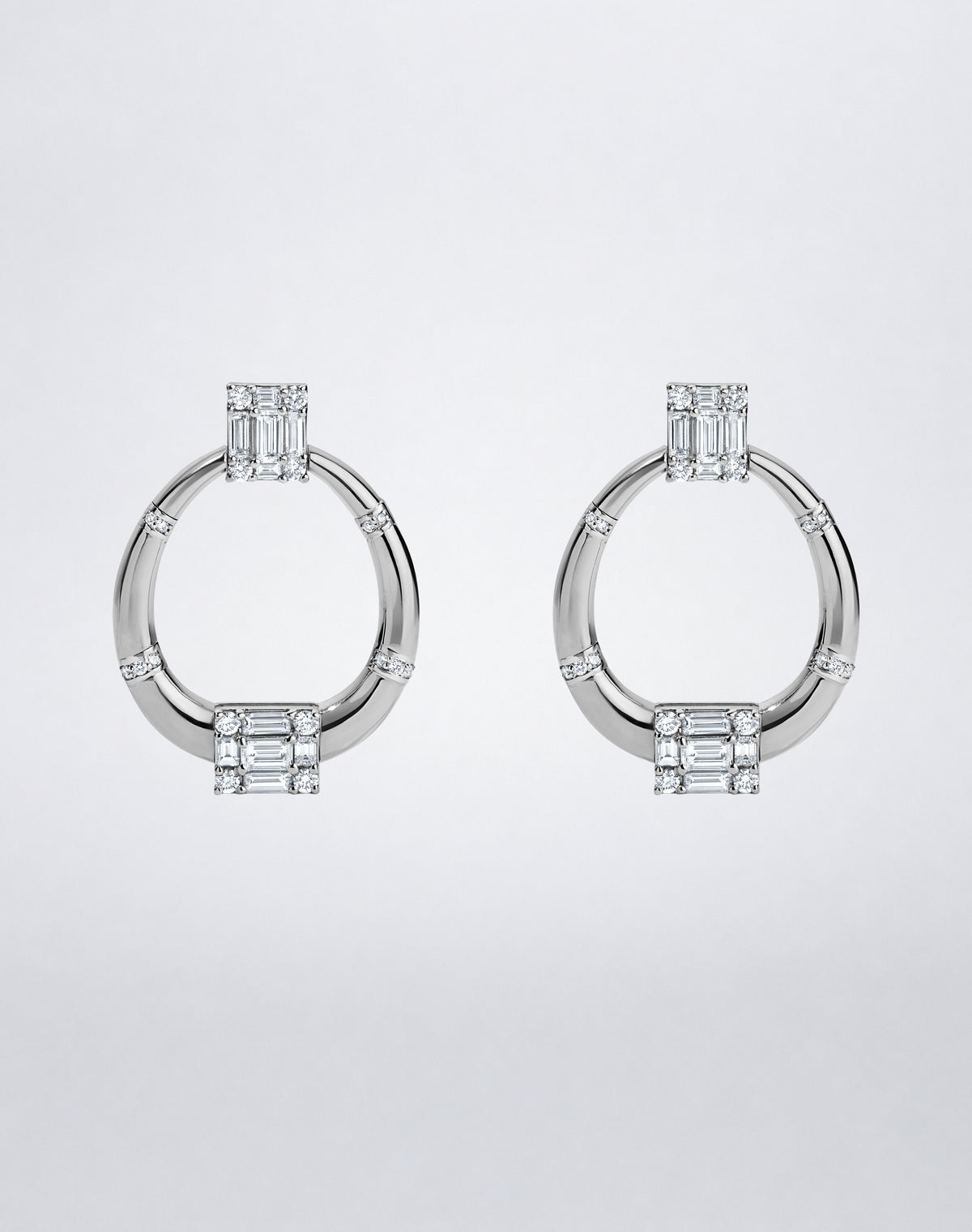 Mindi Mond New York Clarity³ Polished Gold Doorknocker Earrings in 18K white gold, a polished open ring with pavé bands hung between two nine-stone diamond formations