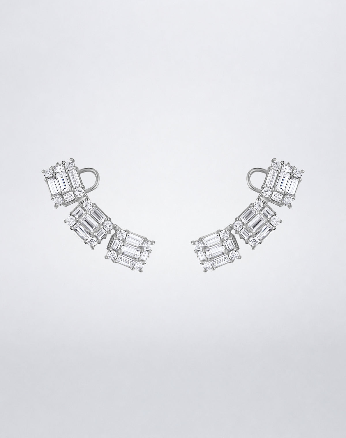 Mindi Mond New York Clarity³ Ear Climbers in 18K white gold, three diamond formations of baguettes and round brilliants set in a rising curve