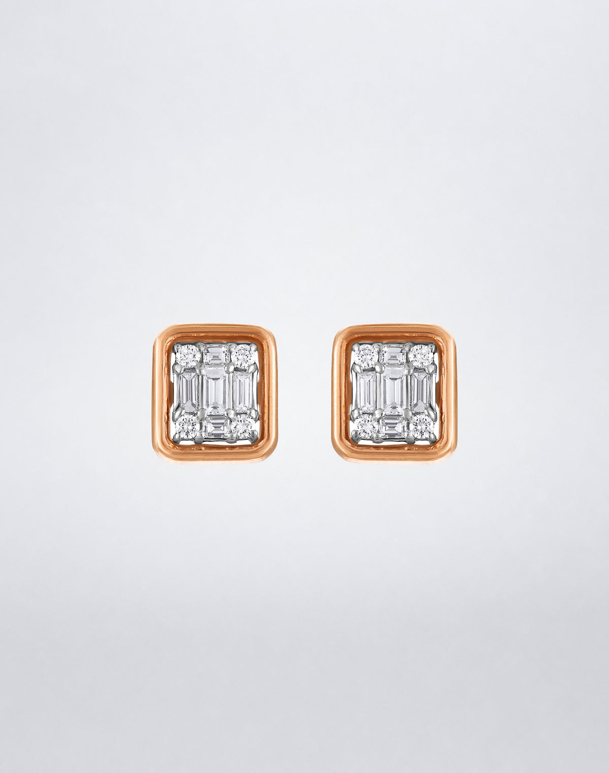 Mindi Mond New York Clarity³ Gold Framed Studs in 18K rose gold, a single diamond formation bordered by a polished rose gold frame
