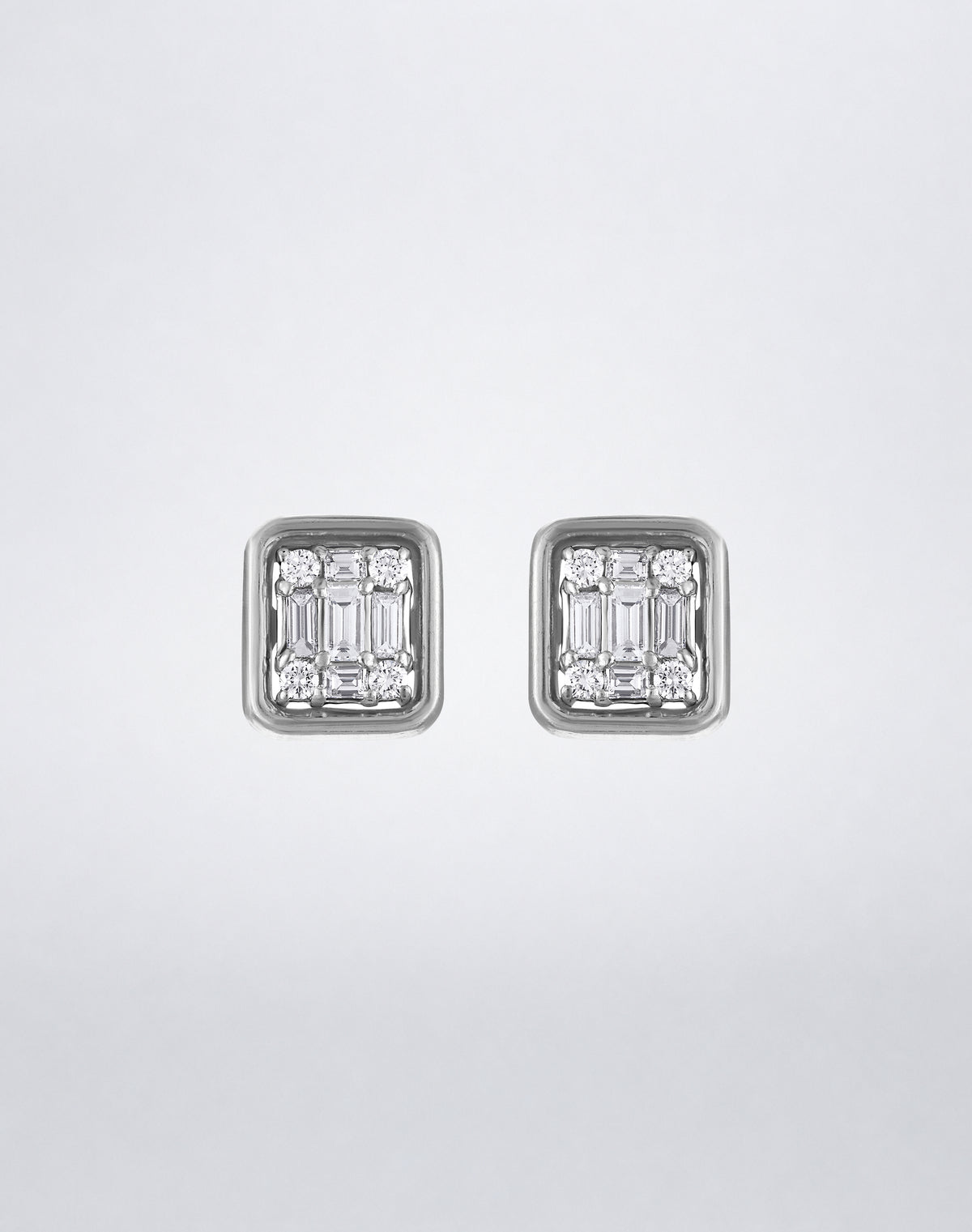 Mindi Mond New York Clarity³ Gold Framed Studs in 18K white gold, a single diamond formation bordered by a polished rose gold frame