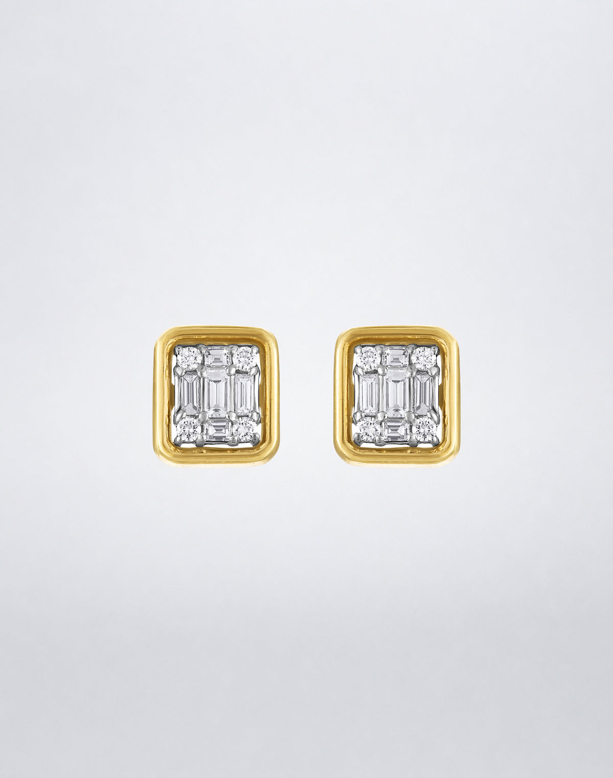 Mindi Mond New York Clarity³ Gold Framed Studs in 18K yellow gold, a single diamond formation bordered by a polished rose gold frame