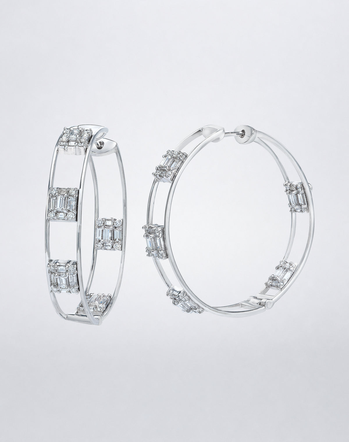 Mindi Mond New York Clarity³ Polished Gold Hoops in 18K white gold, side view showing diamond formations along the open double-rail hoop and hinged closure